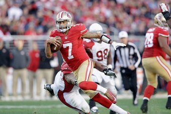 SANTA CLARA, CA - DECEMBER 28:  Colin Kaepernick #7 of the San Francisco 49ers in action against the Arizona Cardinals at Levi's Stadium on December 28, 2014 in Santa Clara, California.  (Photo by Ezra Shaw/Getty Images)