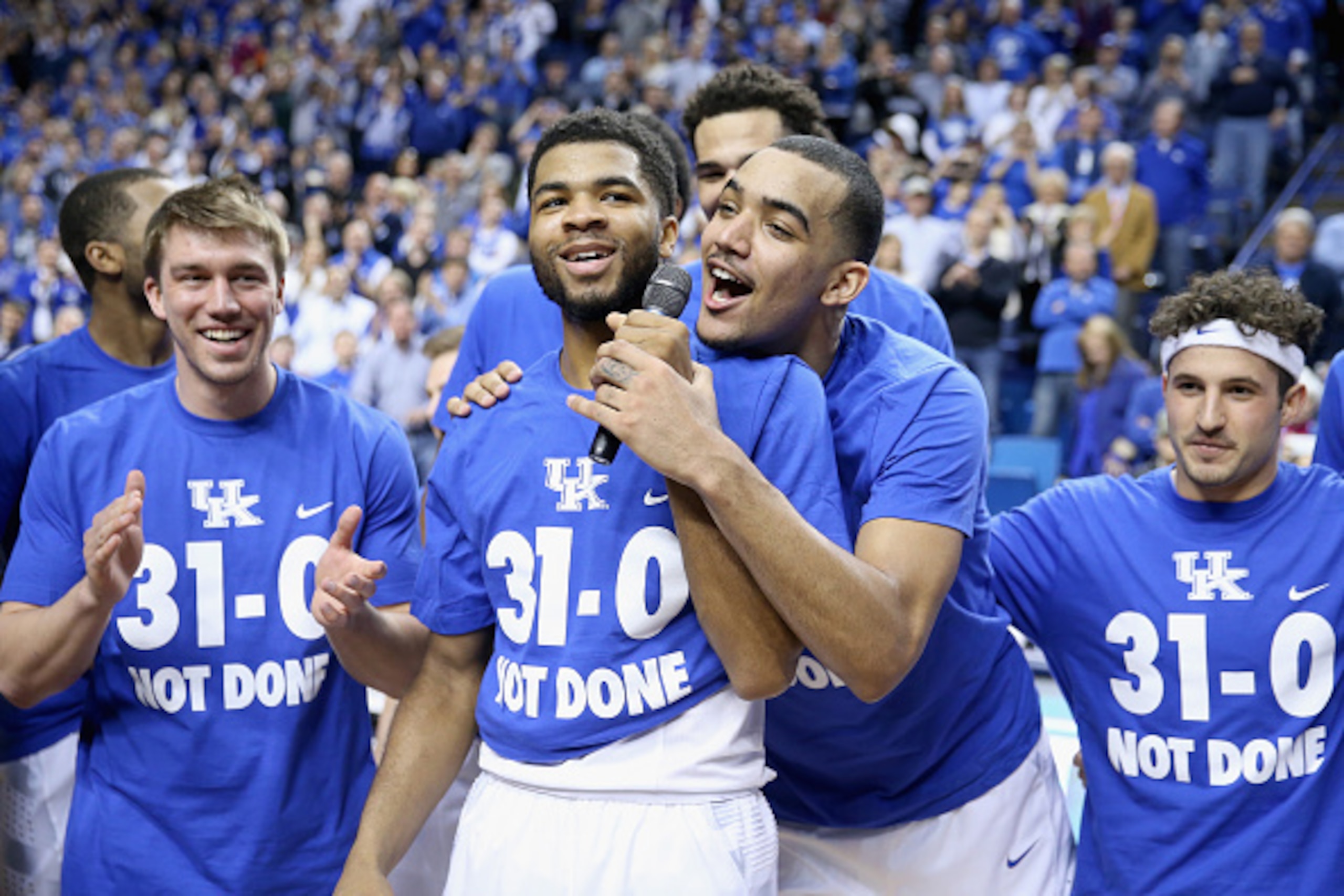 LEXINGTON, KY - MARCH 07: Andrew Harrison #5 (left) and Trey Lyles #41 (right) of the Kentucky Wildcats talk to the crowd following the game against the Florida Gators at Rupp Arena on March 7, 2015 in Lexington, Kentucky. Kentucky won 67-50 to finish th LEXINGTON, KY - MARCH 07: Andrew Harrison #5 (left) and Trey Lyles #41 (right) of the Kentucky Wildcats talk to the crowd following the game against the Florida Gators at Rupp Arena on March 7, 2015 in Lexington, Kentucky. Kentucky won 67-50 to finish th