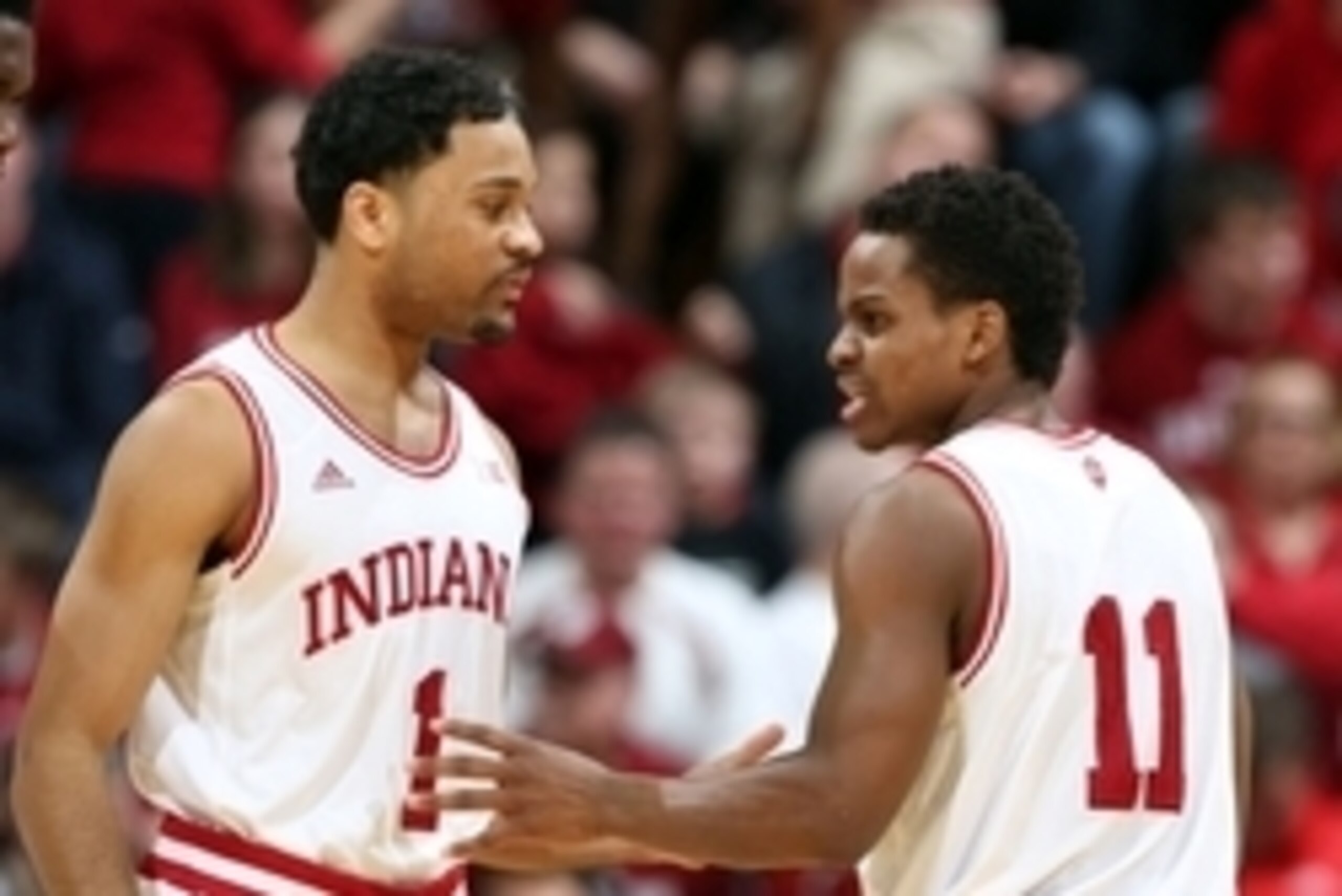 Mar 3, 2015; Bloomington, IN, USA; Indiana Hoosiers guard Yogi Ferrell (11) talks to guard James Blackmon (1) during a game against the Iowa Hawkeyes at Assembly Hall. Iowa defeats Indiana 77-63. Mandatory Credit: Brian Spurlock-USA TODAY Sports