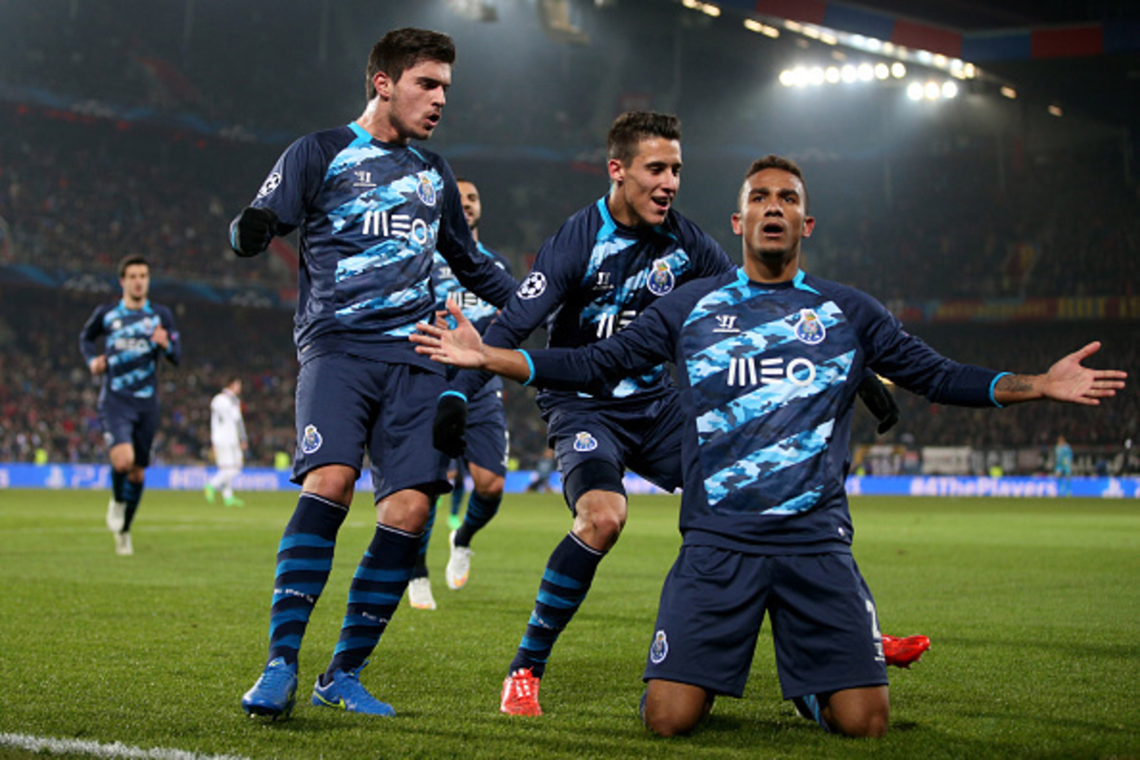 BASEL, SWITZERLAND - FEBRUARY 18: Danilo (R) of FC Porto celebrates with teammates after scoring his team's first goal during the UEFA Champions League Round of 16 match between FC Basel 1893 and FC Porto at St. Jakob-Park on February 18, 2015 in Basel, S