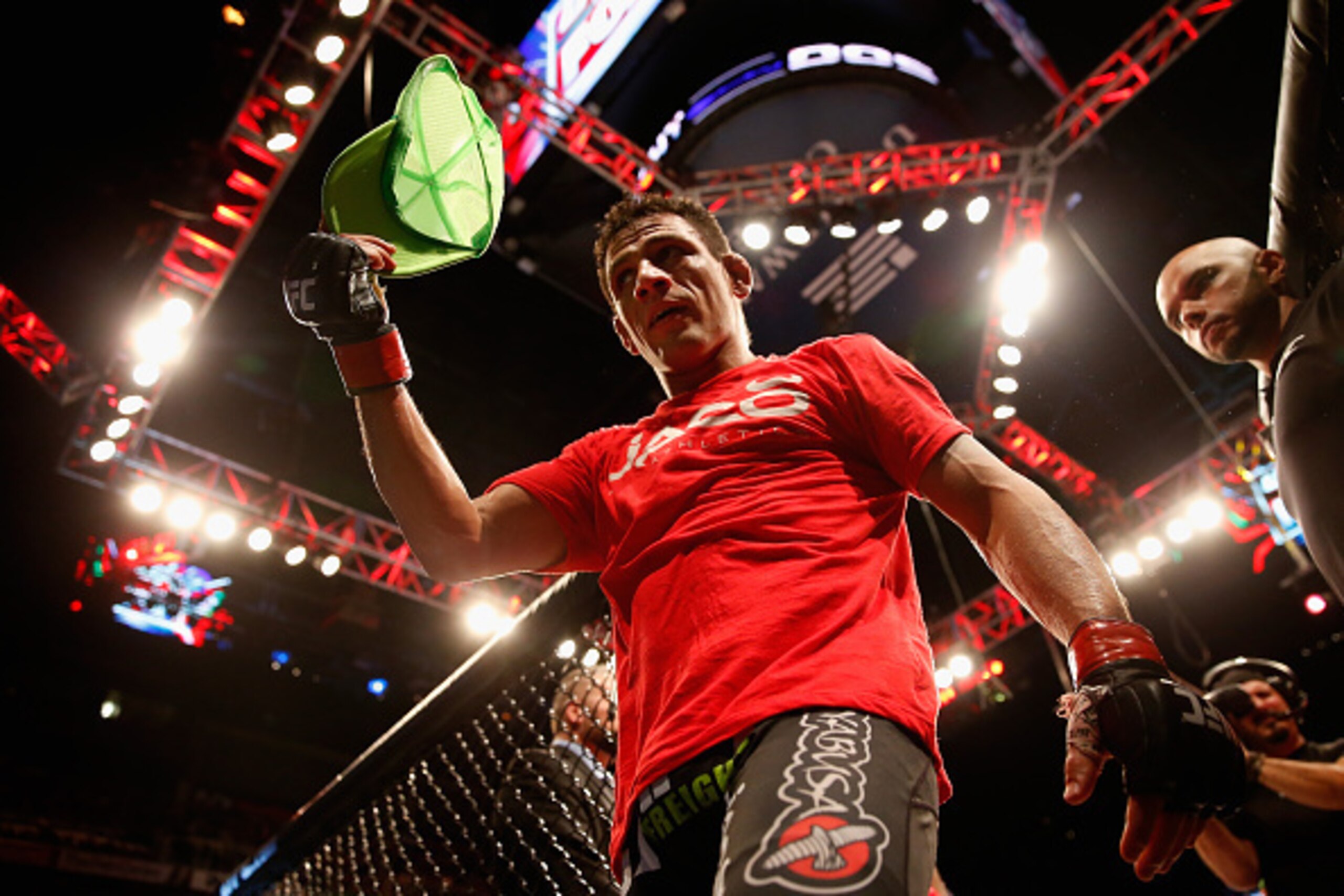 PHOENIX, AZ - DECEMBER 13:  Rafael dos Anjos exits the octagon following his victory by unanimous decision over Nate Diaz (not pictured) in their heavyweight bout during the UFC Fight Night event at the at U.S. Airways Center on December 13, 2014 in Phoen