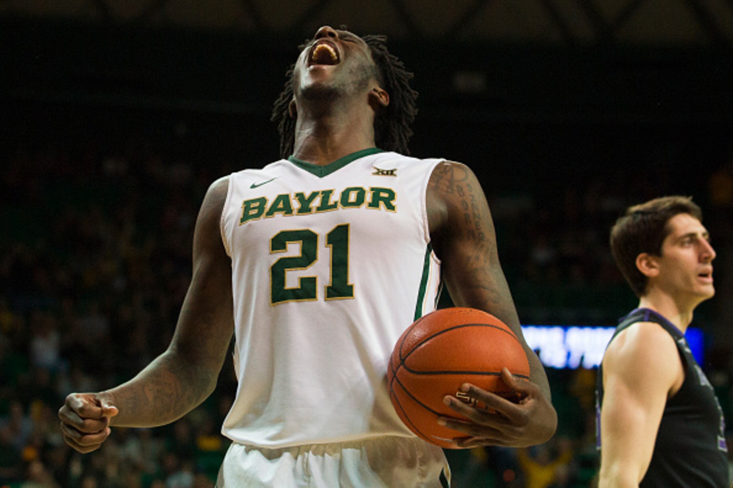 WACO, TX - FEBRUARY 21: Taurean Prince #21 of the Baylor Bears reacts after a made basket by Rico Gathers #2 against the Kansas State Wildcats on February 21, 2015 at the Ferrell Center in Waco, Texas.  (Photo by Cooper Neill/Getty Images)