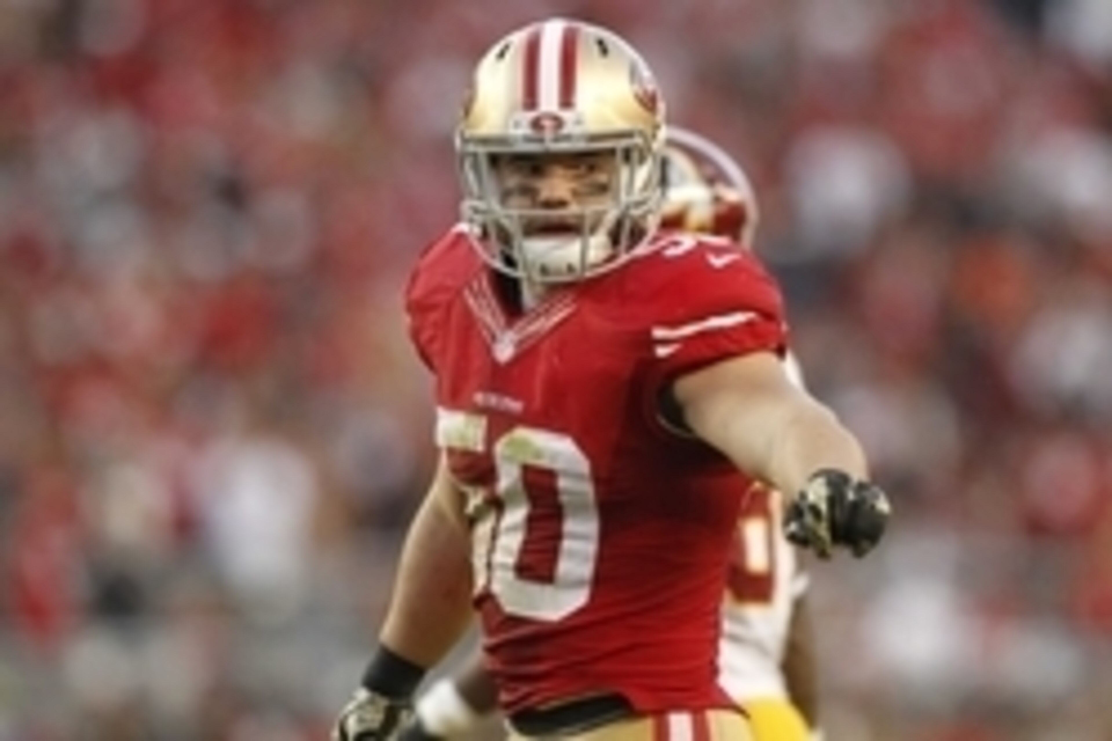 Nov 23, 2014; Santa Clara, CA, USA; San Francisco 49ers inside linebacker Chris Borland (50) stands on the field against the Washington Redskins in the fourth quarter at Levi's Stadium. The 49ers defeated the Redskins 17-13. Mandatory Credit: Cary Edmonds