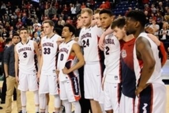 Feb 28, 2015; Spokane, WA, USA; Gonzaga Bulldogs mens basketball team meets at center court after a game against the Brigham Young Cougars at McCarthey Athletic Center. The Cougars won 73-70. Mandatory Credit: James Snook-USA TODAY Sports