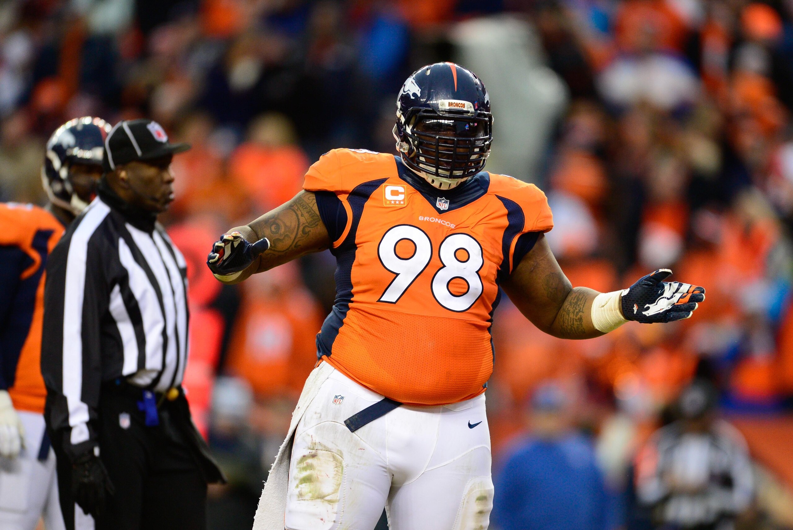 Jan 11, 2015; Denver, CO, USA; Denver Broncos defensive tackle Terrance Knighton (98) reacts to a play during the first quarter of the 2014 AFC Divisional playoff football game against the Indianapolis Colts at Sports Authority Field at Mile High. Mandato