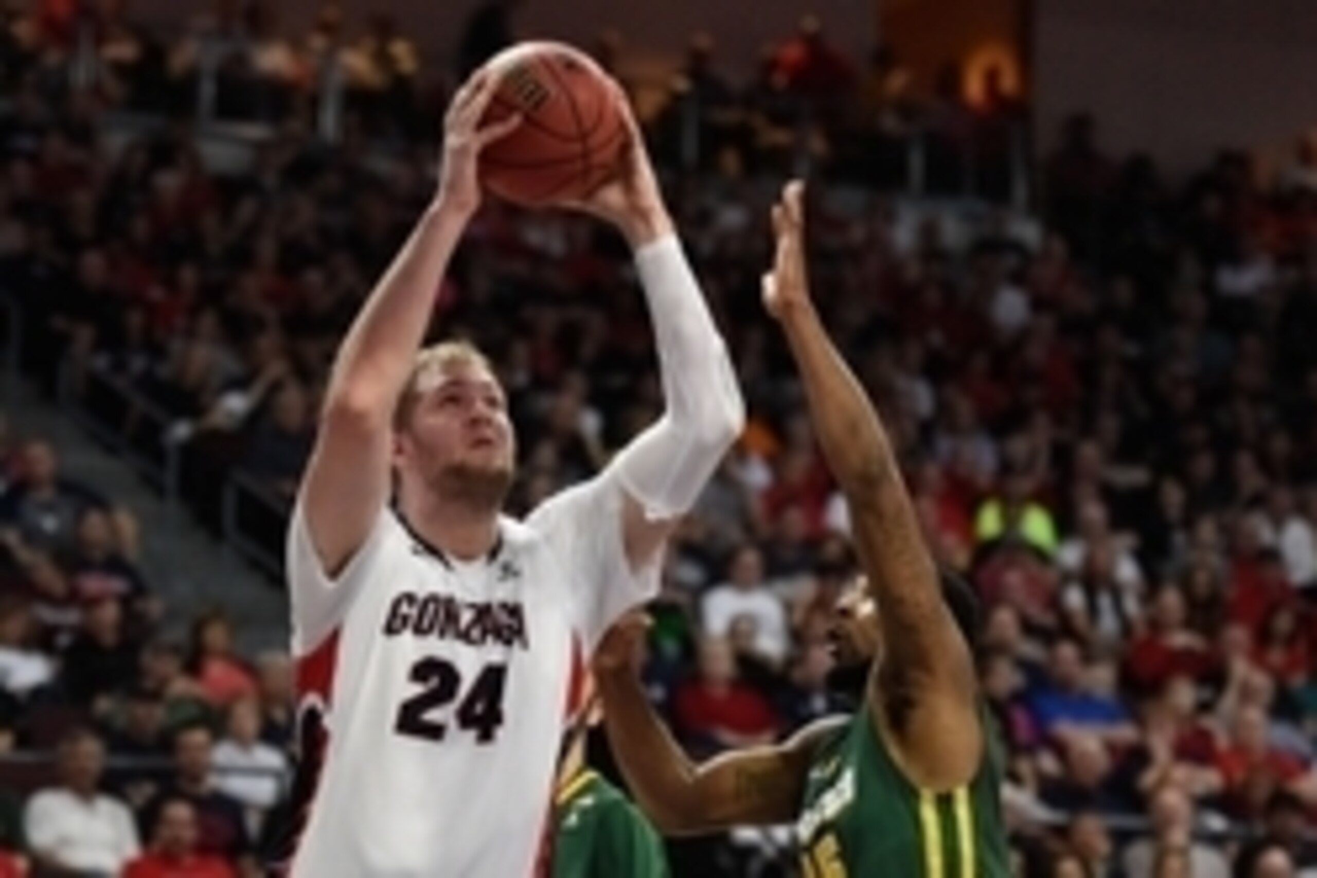 March 7, 2015; Las Vegas, NV, USA; Gonzaga Bulldogs center Przemek Karnowski (24) dunks the basketball against San Francisco Dons forward/center Kruize Pinkins (15) during the first half in the quarterfinals of the West Coast Conference tournament at Orle