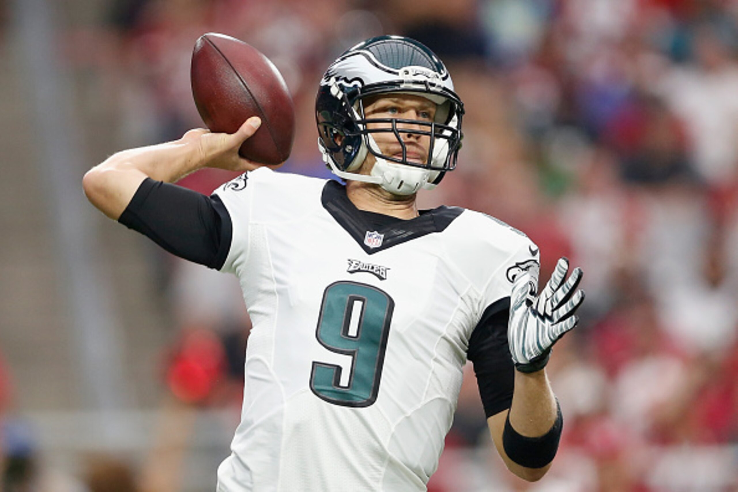 GLENDALE, AZ - OCTOBER 26:  Quarterback Nick Foles #9 of the Philadelphia Eagles throws a pass during the NFL game against the Arizona Cardinals at the University of Phoenix Stadium on October 26, 2014 in Glendale, Arizona.  (Photo by Christian Petersen/G
