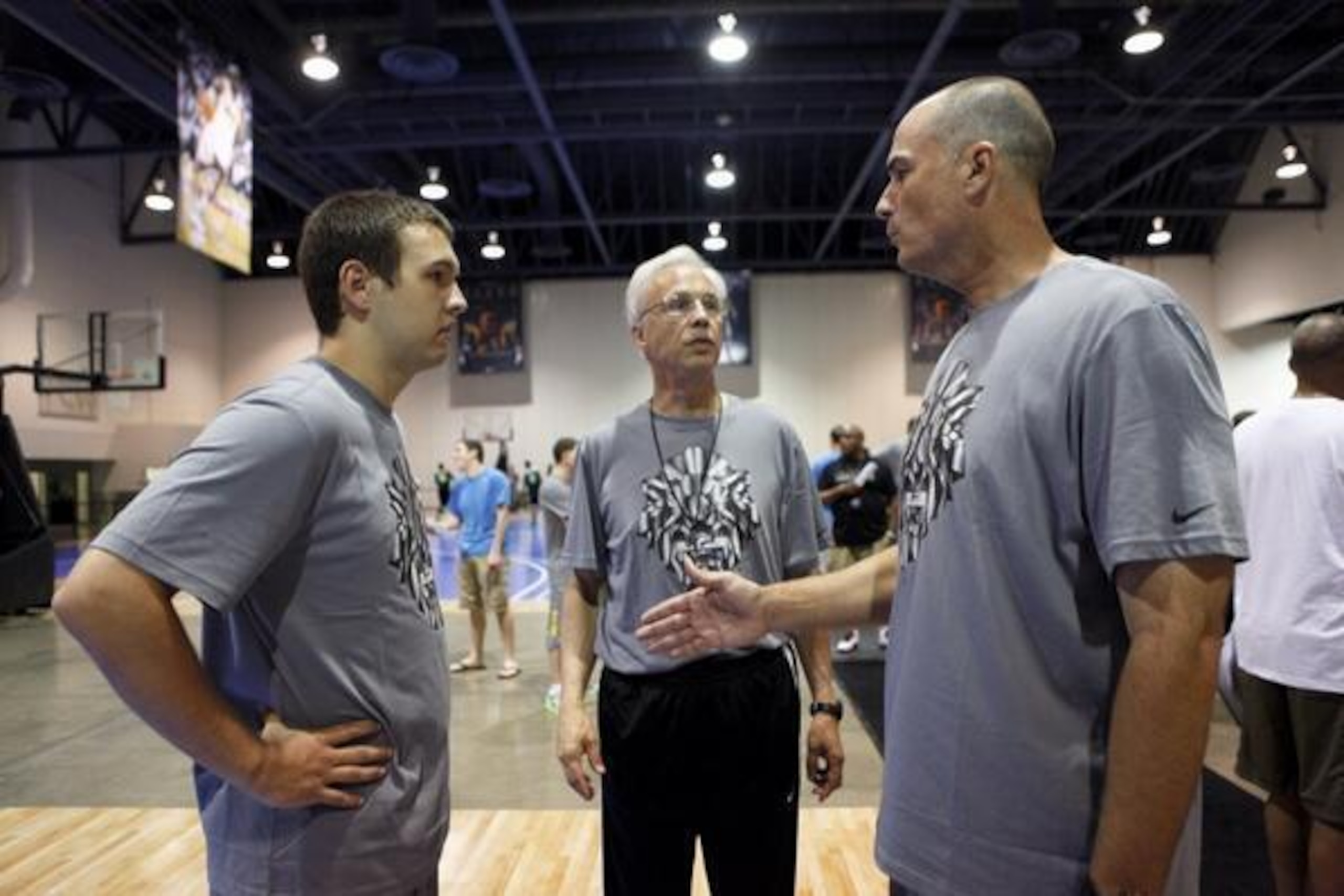 From left: Jake Eastman, Clippers executive (and Jake's father) Kevin Eastman and basketball analyst Jay Bilas