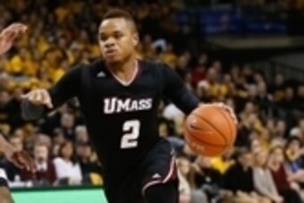 Feb 21, 2015; Richmond, VA, USA; Massachusetts Minutemen guard Derrick Gordon (2) dribbles the ball against the Virginia Commonwealth Rams at Stuart Siegel Center. Mandatory Credit: Amber Searls-USA TODAY Sports