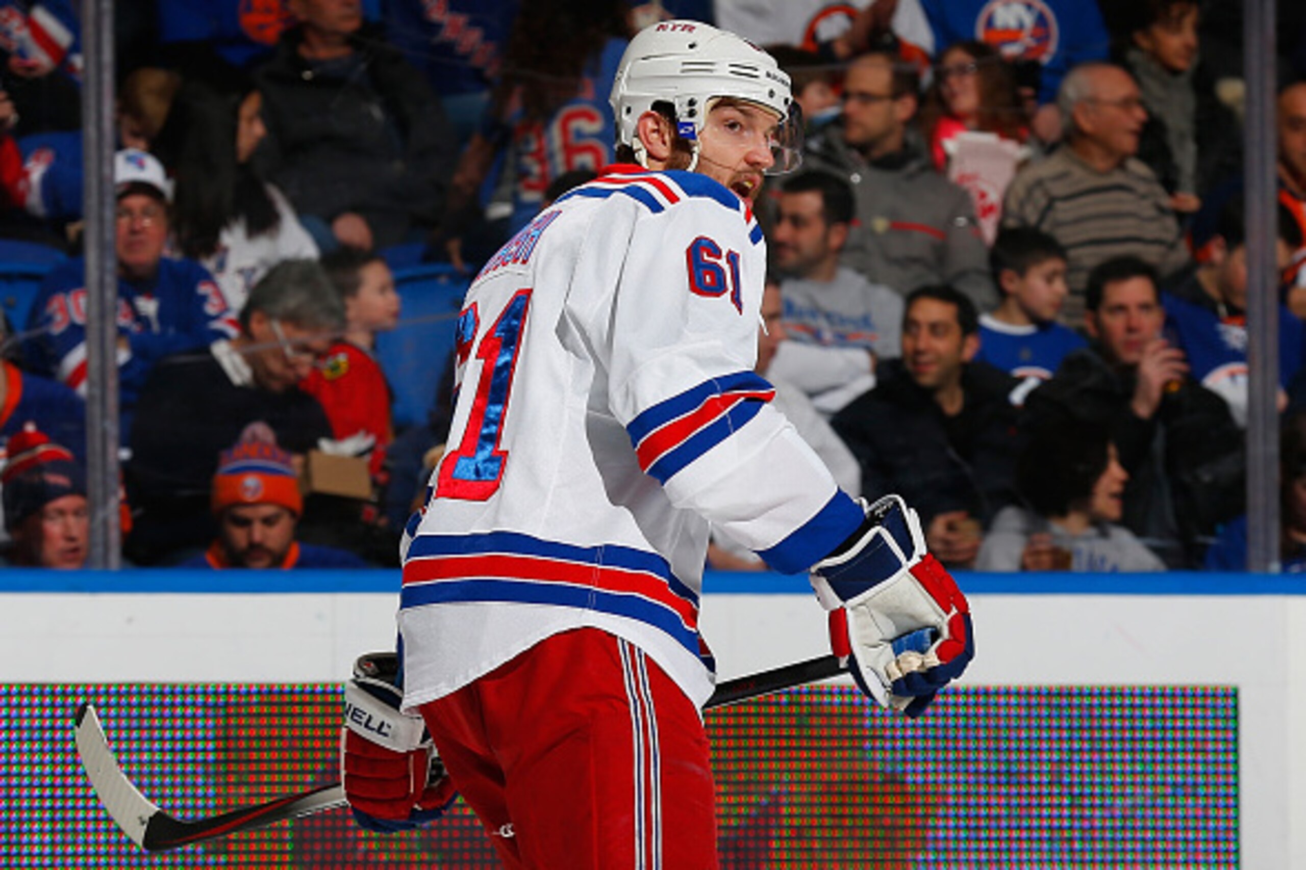 UNIONDALE, NY - FEBRUARY 16:  Rick Nash #61 of the New York Rangers skates against the New York Islanders at Nassau Veterans Memorial Coliseum on February 16, 2015 in Uniondale, New York. Rangers defeated the Islanders 6-5.  (Photo by Mike Stobe/NHLI via 