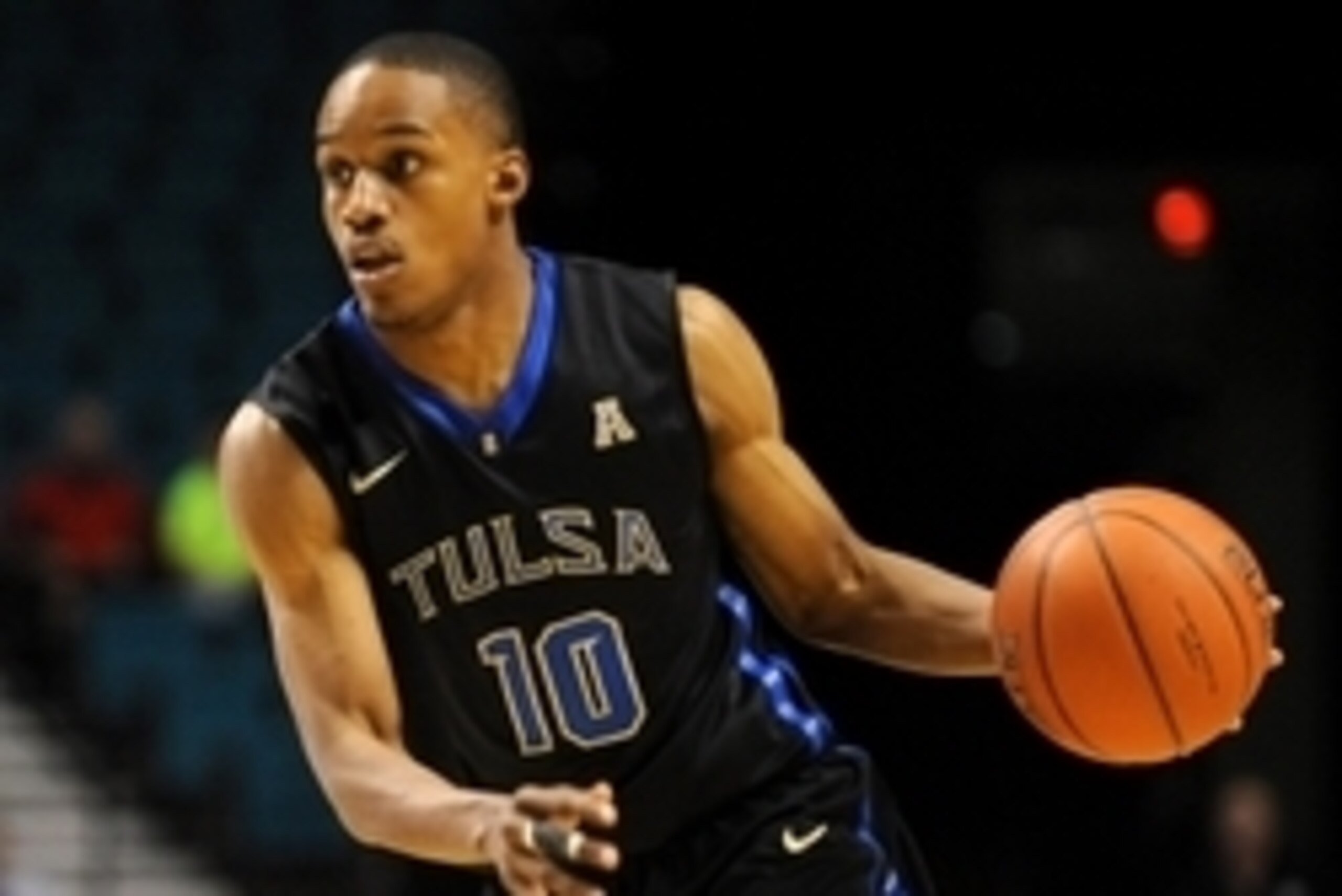 Nov 24, 2014; Las Vegas, NV, USA; Tulsa Golden Hurricane guard James Woodard (10) dribbles the ball during an NCAA basketball game against Auburn at MGM Grand. Mandatory Credit: Stephen R. Sylvanie-USA TODAY Sports