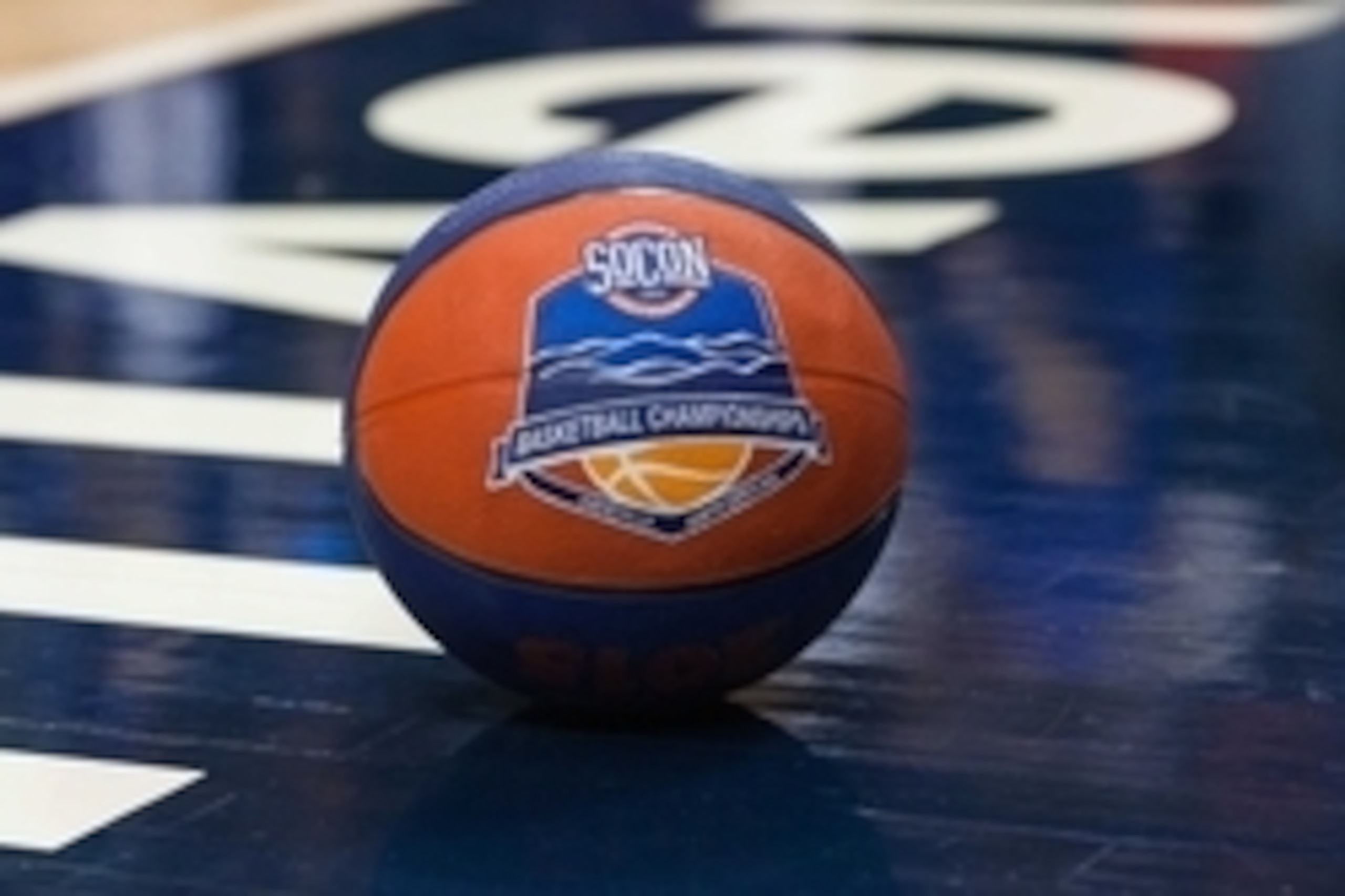 Mar 8, 2015; Asheville, NC, USA; A Southern Conference tournament basketball lays on the floor during a timeout in the game between the Mercer Bears and the Furman Paladins in the semi-finals of the Southern Conference tournament held at the US Cellular C