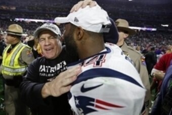 iFeb 1, 2015; Glendale, AZ, USA; New England Patriots head coach Bill Belichick celebrates with cornerback Darrelle Revis (24) after beating the Seattle Seahawks in Super Bowl XLIX at University of Phoenix Stadium. Mandatory Credit: Matthew Emmons-USA TOD