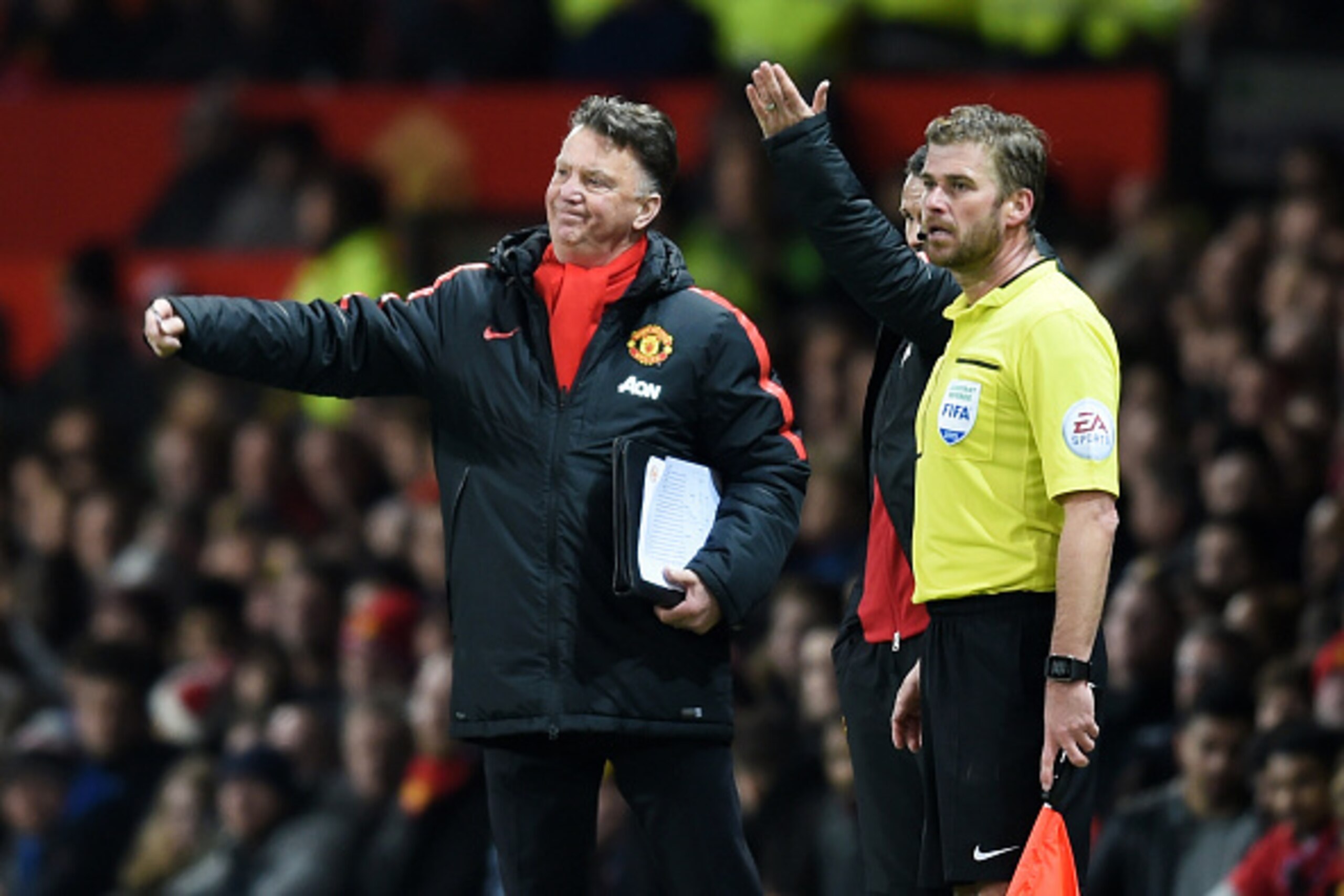 MANCHESTER, ENGLAND - MARCH 09:  Louis van Gaal the manager of Manchester United reacts during the FA Cup Quarter Final match between Manchester United and Arsenal at Old Trafford on March 9, 2015 in Manchester, England.  (Photo by Michael Regan/Getty Ima