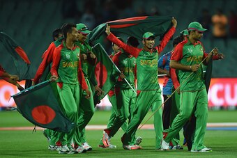 ADELAIDE, AUSTRALIA - MARCH 09:  Bangladesh celebrate after winning the 2015 ICC Cricket World Cup match between England and Bangladesh at Adelaide Oval on March 9, 2015 in Adelaide, Australia.  (Photo by Shaun Botterill/Getty Images)