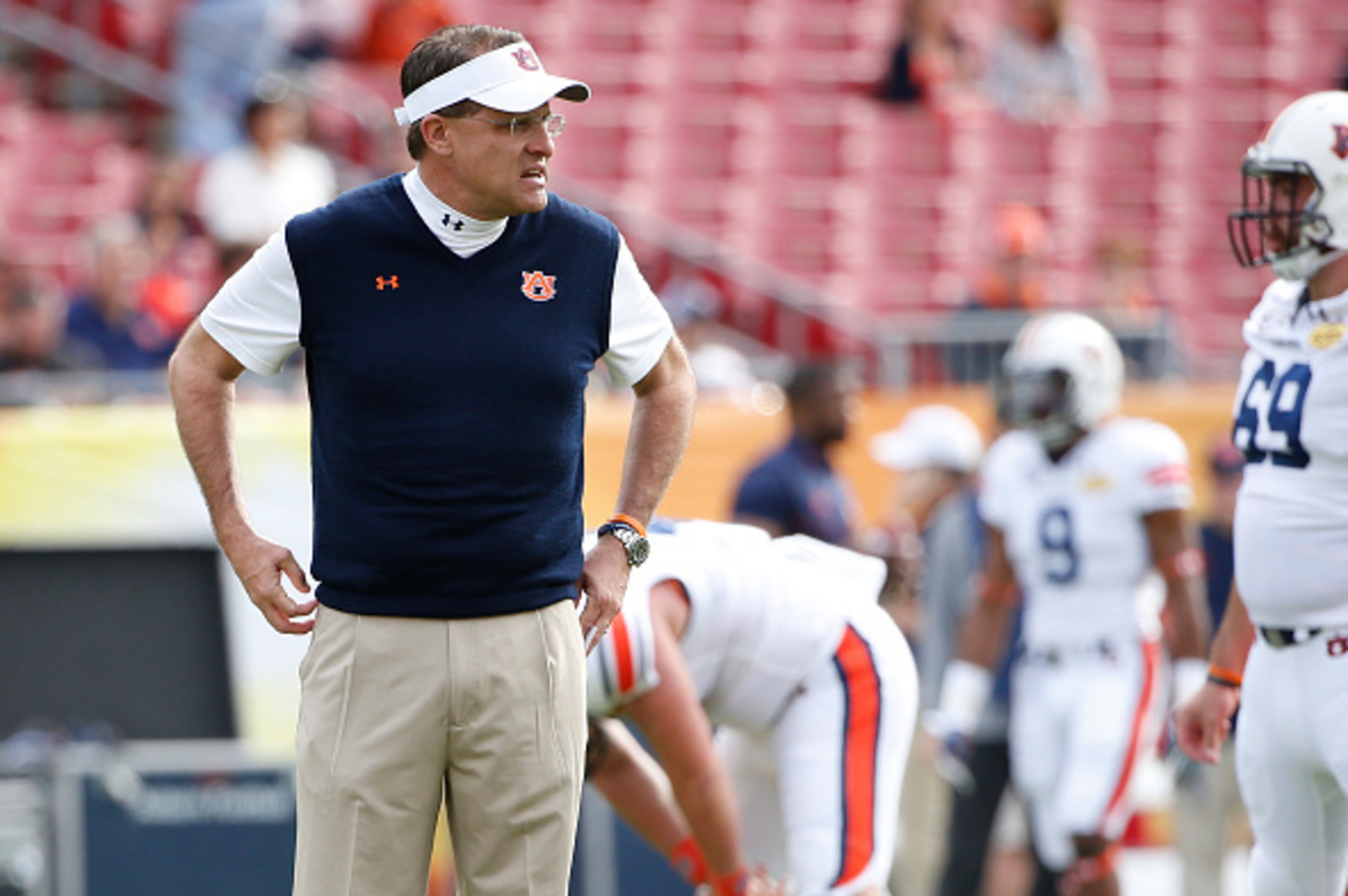 TAMPA, FL - JANUARY 1: Head coach Gus Malzahn of the Auburn Tigers looks over his players as they warm up before the start of the Outback Bowl against the Wisconsin Badgers on January 1, 2015 at Raymond James Stadium in Tampa, Florida. (Photo by Brian TAMPA, FL - JANUARY 1: Head coach Gus Malzahn of the Auburn Tigers looks over his players as they warm up before the start of the Outback Bowl against the Wisconsin Badgers on January 1, 2015 at Raymond James Stadium in Tampa, Florida. (Photo by Brian
