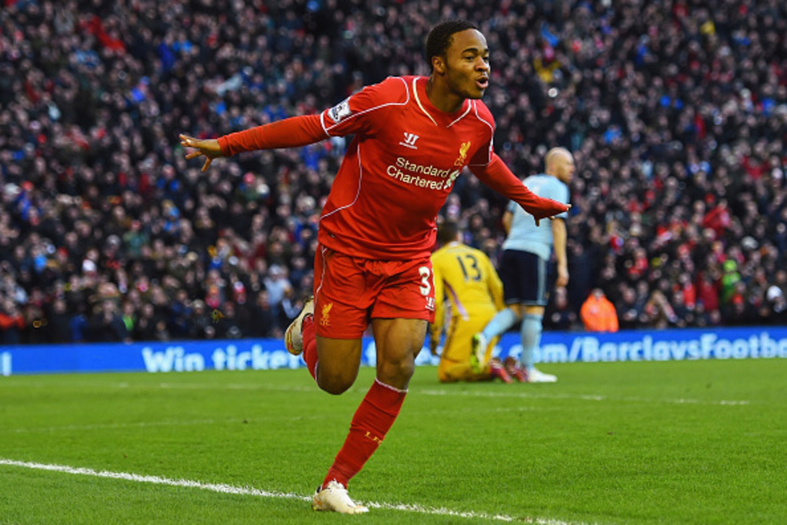LIVERPOOL, ENGLAND - JANUARY 31:  Raheem Sterling of Liverpool celebrates scoring the opening goal during the Barclays Premier League match between Liverpool and West Ham United at Anfield on January 31, 2015 in Liverpool, England.  (Photo by Shaun Botter