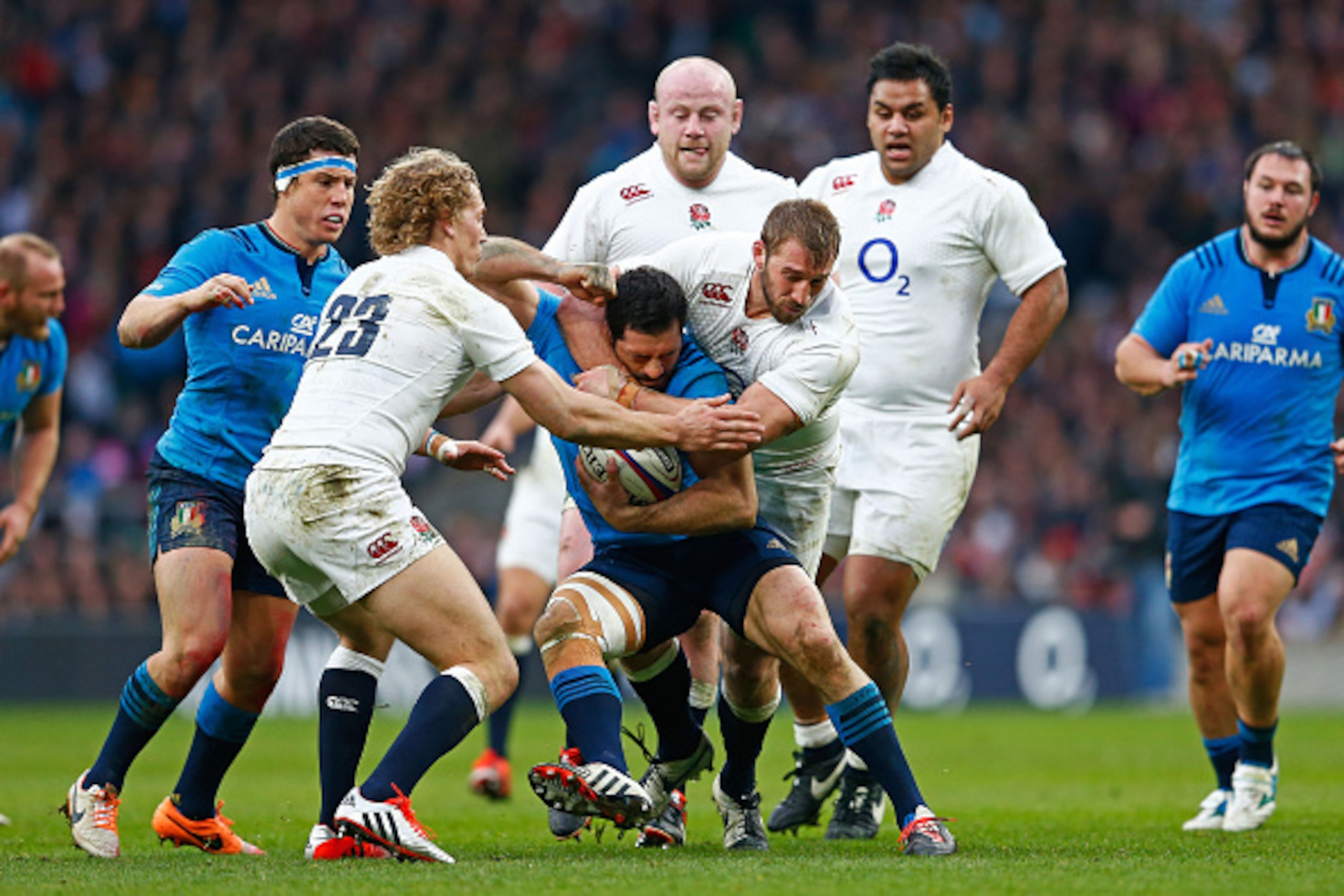LONDON, ENGLAND - FEBRUARY 14: Andrea Masi of Italy is tackled by Chris Robshaw of England during the RBS Six Nations match between England and Italy at Twickenham Stadium on February 14, 2015 in London, England.  (Photo by Julian Finney/Getty Images)