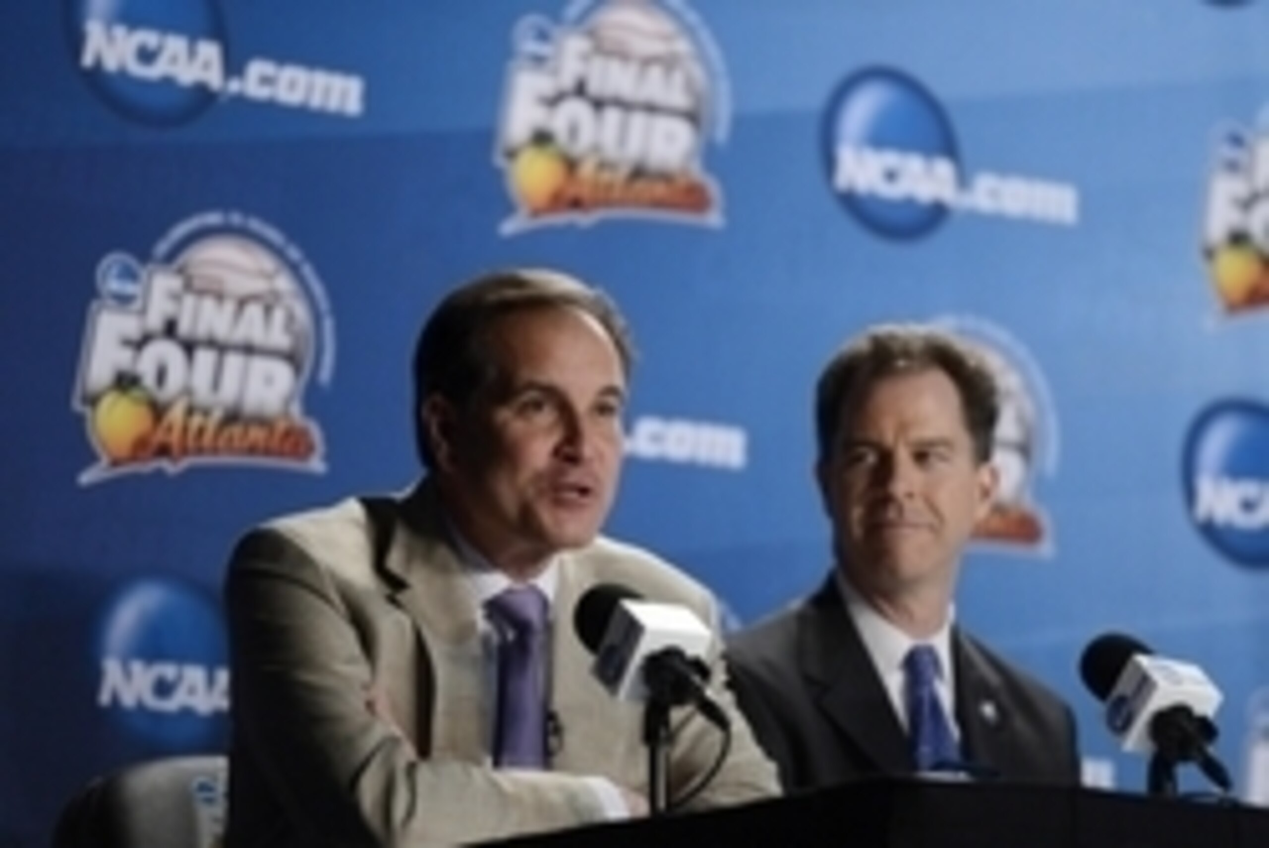 Apr 5, 2013; Atlanta, GA, USA; CBS broadcaster Jim Nantz (left) sits next to NCAA vice president Dan Gavitt (right) during the 75 years of March madness press conference in preparation for the Final Four of the 2013 NCAA basketball tournament at the Georg