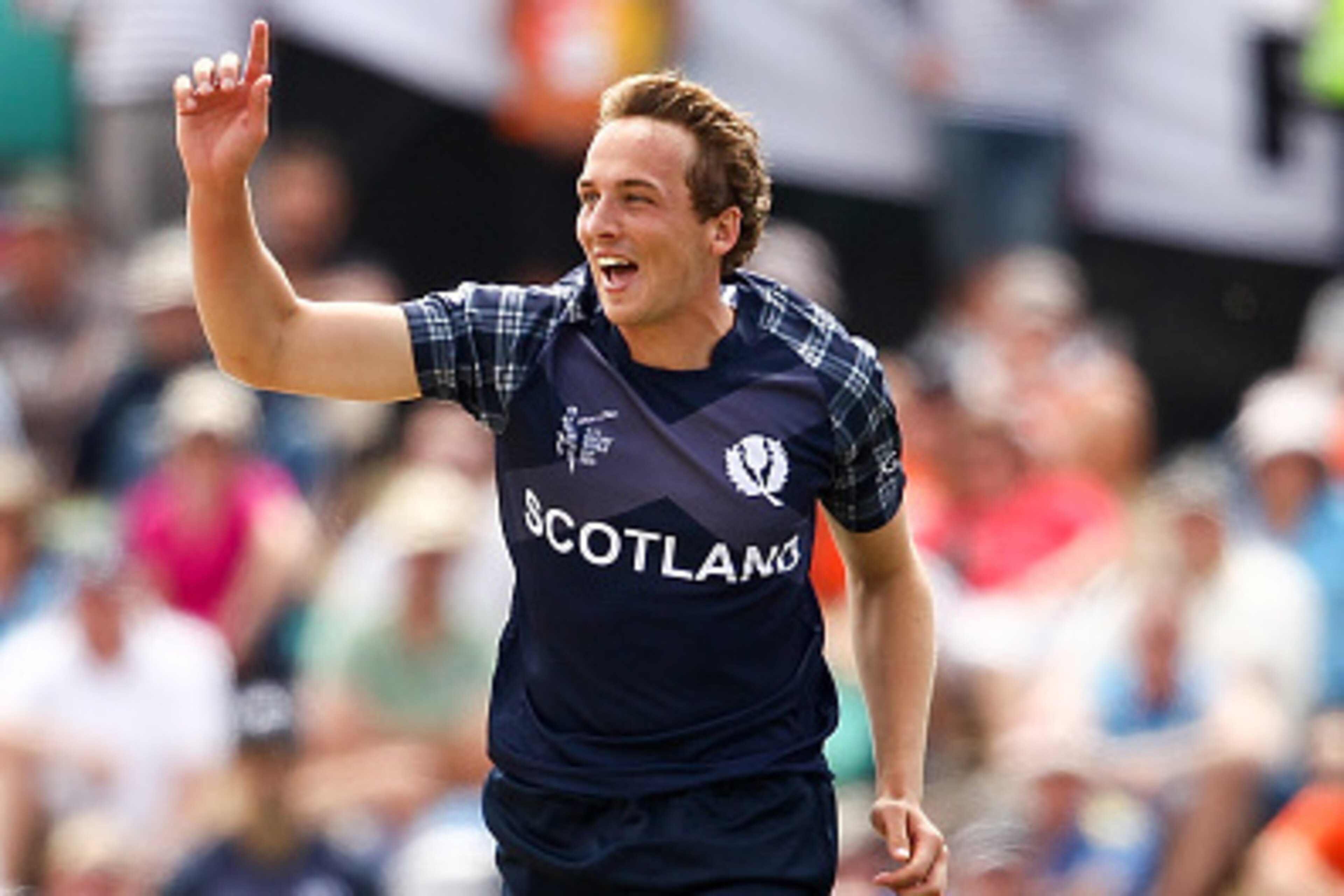 CHRISTCHURCH, NEW ZEALAND - FEBRUARY 23:  Josh Davey of Scotland celebrates after dismissing James Taylor of England during the 2015 ICC Cricket World Cup match between England and Scotland at Hagley Oval on February 23, 2015 in Christchurch, New Zealand.