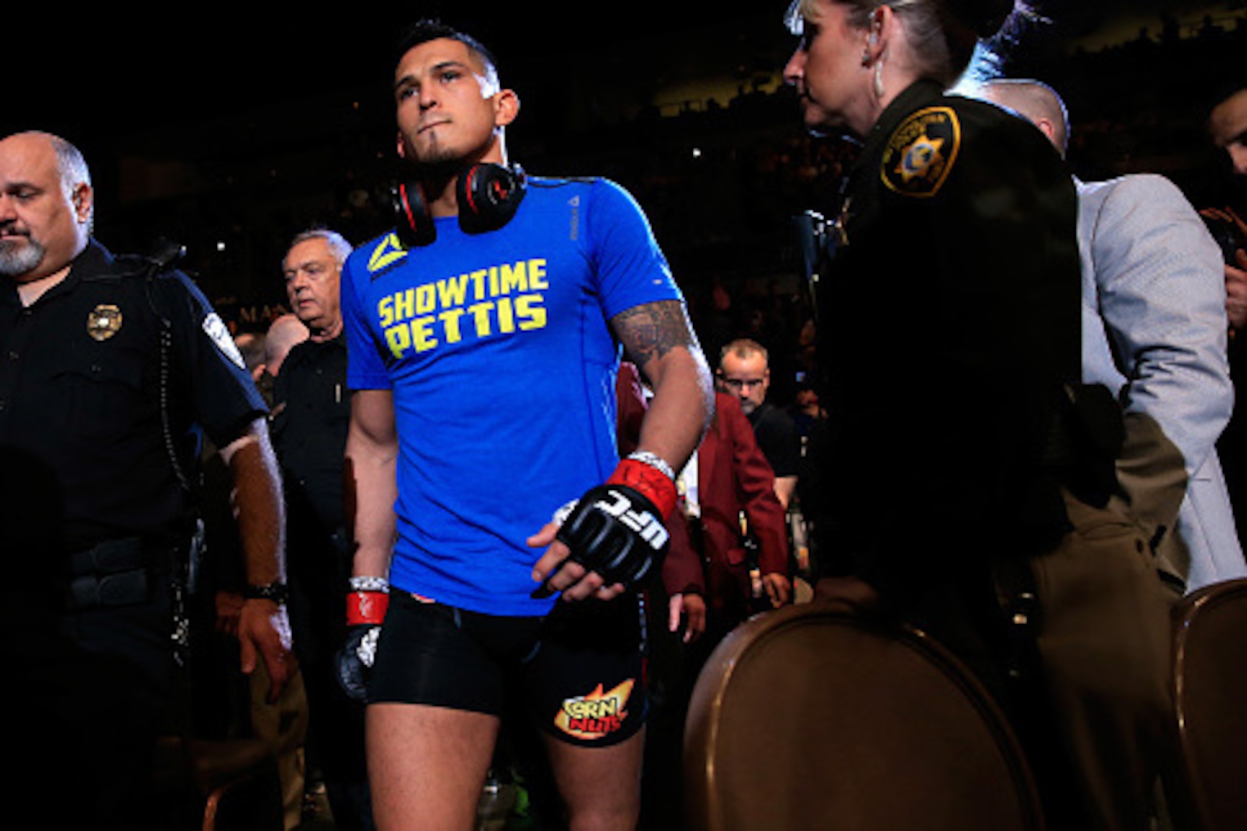 LAS VEGAS, NV - DECEMBER 06:  Anthony Pettis walks to the octagon prior to a lightweight title fight against Gilbert Menendez during the UFC 181 event at the Mandalay Bay Events Center on December 6, 2014 in Las Vegas, Nevada.  (Photo by Alex Trautwig/Get