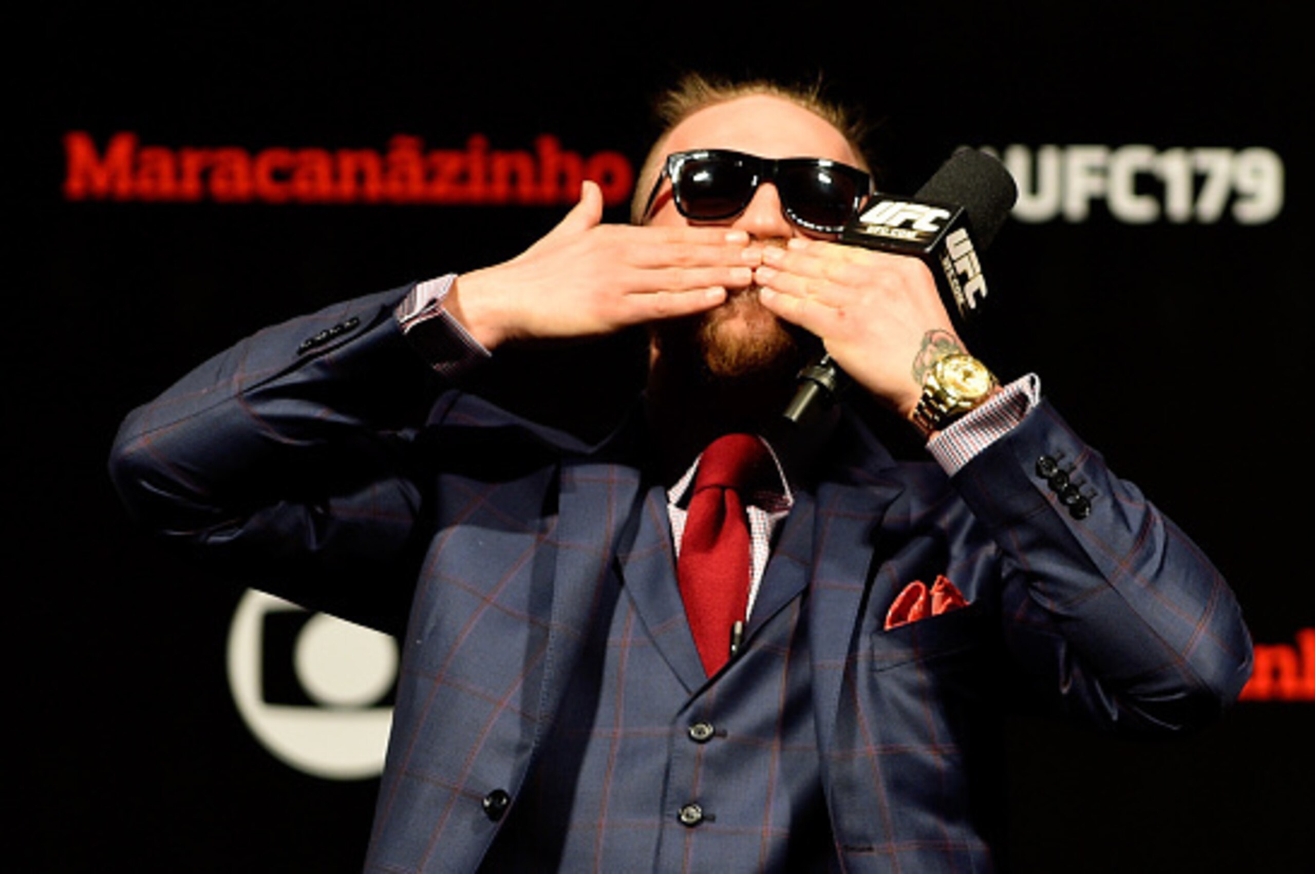 RIO DE JANEIRO, BRAZIL - OCTOBER 24:  Conor McGregor of Ireland interacts with fans during a Q&A session before the UFC 179 weigh-in  at Maracanazinho on October 24, 2014 in Rio de Janeiro, Brazil.  (Photo by Buda Mendes/Getty Images)