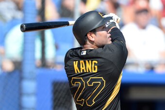 Mar 3, 2015; Dunedin, FL, USA; Pittsburgh Pirates shortstop Jung Ho Kang (27) hits a solo home run in the third inning of a spring training baseball game against the Toronto Blue Jays at Florida Auto Exchange Park. Mandatory Credit: Tommy Gilligan-USA TOD