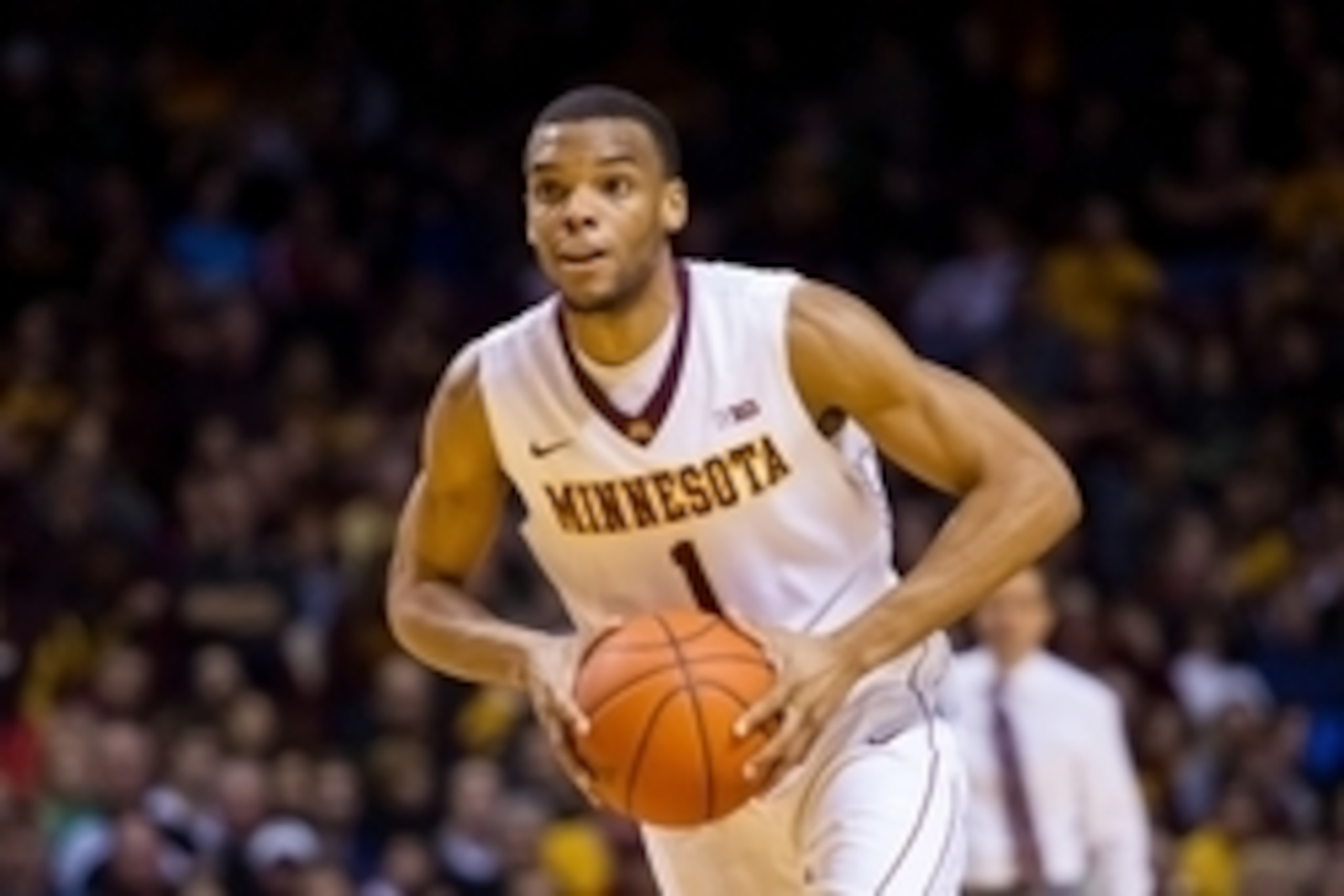 Jan 31, 2015; Minneapolis, MN, USA; Minnesota Gophers guard Andre Hollins (1) passes in the second half against the Nebraska Cornhuskers at Williams Arena. The Minnesota Gophers beat the Nebraska Cornhuskers 60-42. Mandatory Credit: Brad Rempel-USA TODAY 