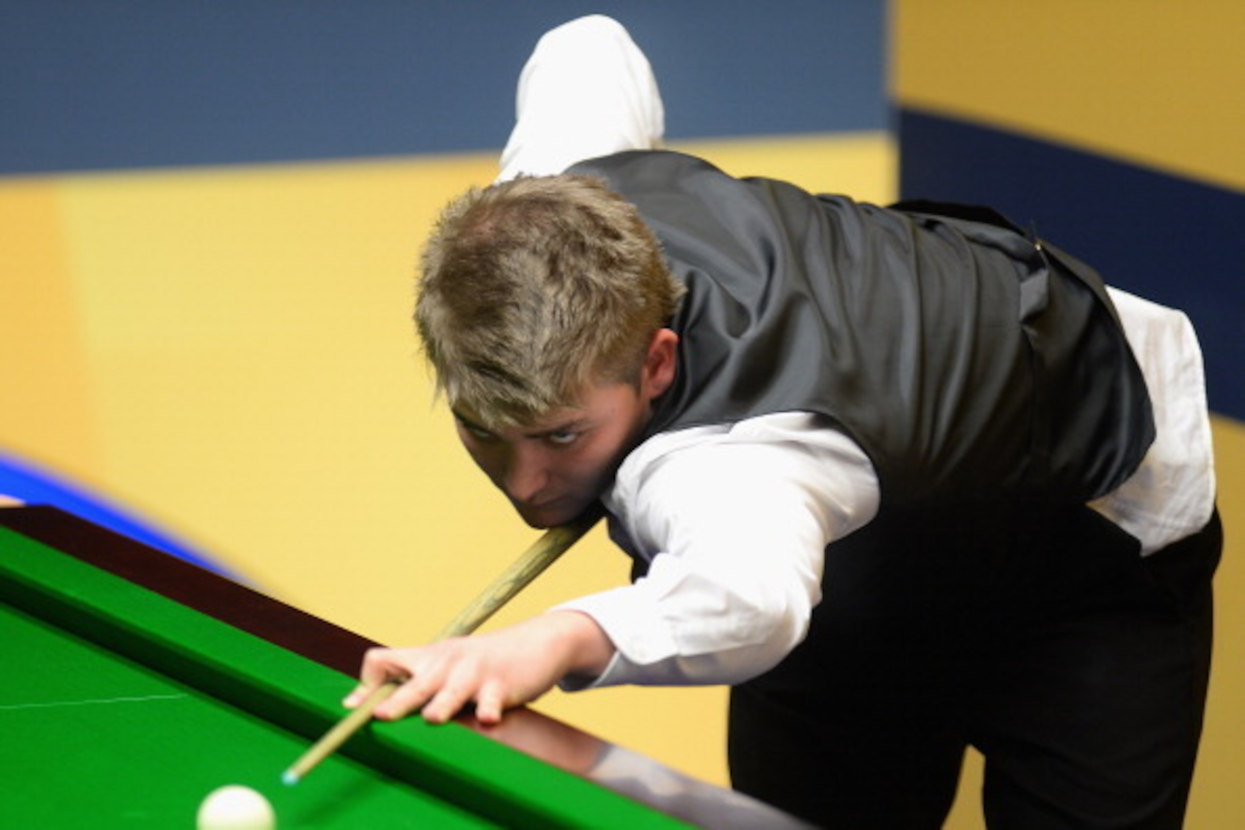 SHEFFIELD, ENGLAND - APRIL 20:  Michael White of Wales in action during his first round match against Mark Williams of Wales during the Betfair World Snooker Championship at the Crucible Theatre on April 20, 2013 in Sheffield, England.  (Photo by Laurence