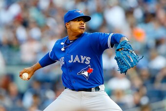 NEW YORK, NY - SEPTEMBER 20:  Marcus Stroman #54 of the Toronto Blue Jays pitches in the third inning against the New York Yankees at Yankee Stadium on September 20, 2014 in the Bronx borough of New York City.  (Photo by Jim McIsaac/Getty Images)