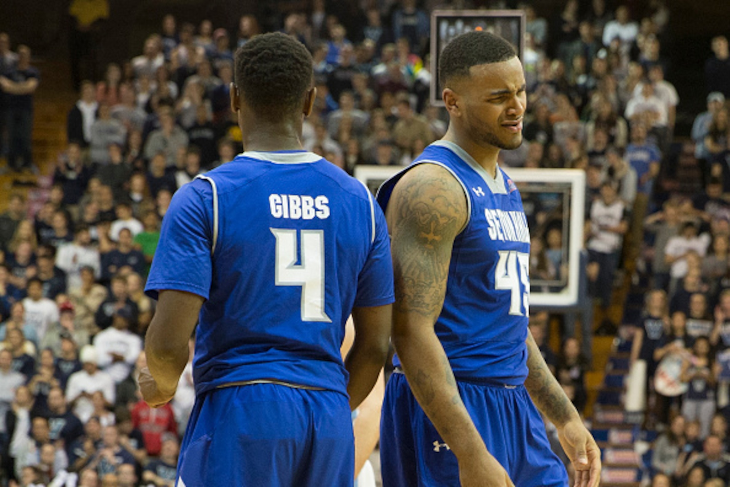 VILLANOVA, PA - FEBRUARY 16: Sterling Gibbs #4 and Stephane Manga #45 of the Seton Hall Pirates react after a foul in the game against the Villanova Wildcats on February 16, 2015 at the Pavilion in Villanova, Pennsylvania.  The Wildcats defeated the Pirat
