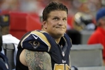 Sep 14, 2014; Tampa, FL, USA; St. Louis Rams tackle Jake Long (77) during the second half against the Tampa Bay Buccaneers at Raymond James Stadium. St. Louis Rams defeated the Tampa Bay Buccaneers 19-17. Mandatory Credit: Kim Klement-USA TODAY Sports