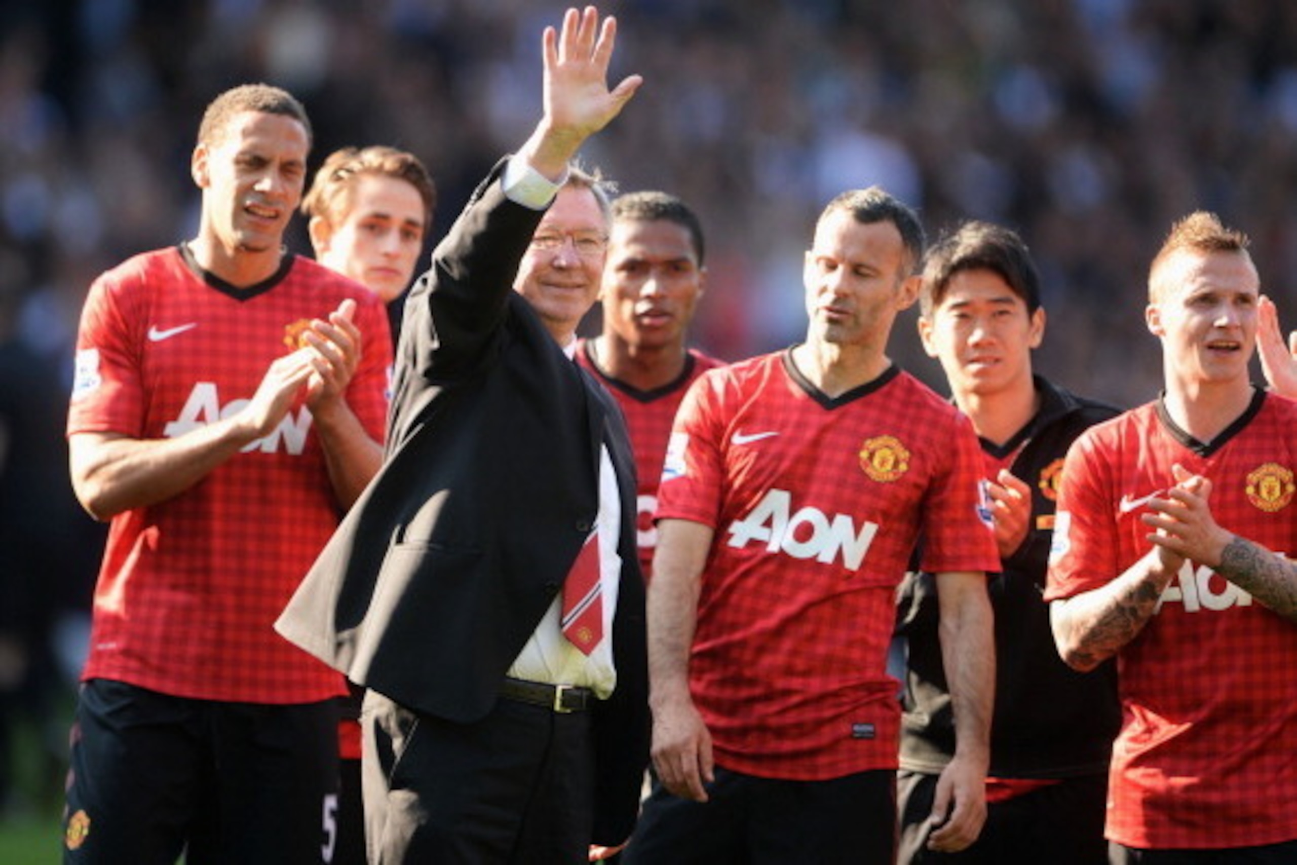 WEST BROMWICH, ENGLAND - MAY 19:  Manchester United manager Sir Alex Ferguson is applauded by players after his 1,500th and final match in charge of the club following the Barclays Premier League match between West Bromwich Albion and Manchester United at