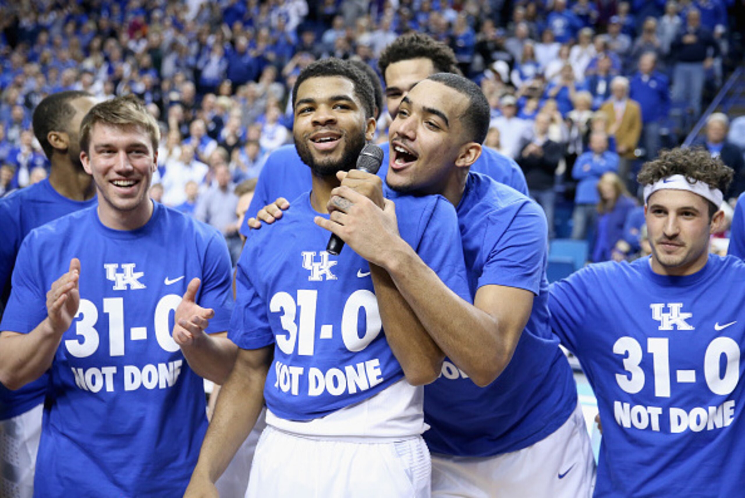 LEXINGTON, KY - MARCH 07:  Andrew Harrison #5 (left) and Trey Lyles #41 (right) of the Kentucky Wildcats talk to the crowd following the game against the Florida Gators at Rupp Arena on March 7, 2015 in Lexington, Kentucky. Kentucky won 67-50 to finish th