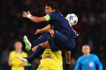 PARIS, FRANCE - FEBRUARY 17:  Thiago Silva of Paris Saint-Germain is challenged by Diego Costa of Chelsea during the UEFA Champions League Round of 16 match between Paris Saint-Germain and Chelsea at Parc des Princes on February 17, 2015 in Paris, France.