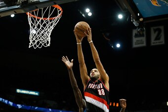 MINNEAPOLIS, MN - MARCH 7: Nicolas Batum #88 of the Portland Trail Blazers goes for the lay up against the Minnesota Timberwolves during the game on March 7, 2015 at Target Center in Minneapolis, Minnesota. NOTE TO USER: User expressly acknowledges and ag