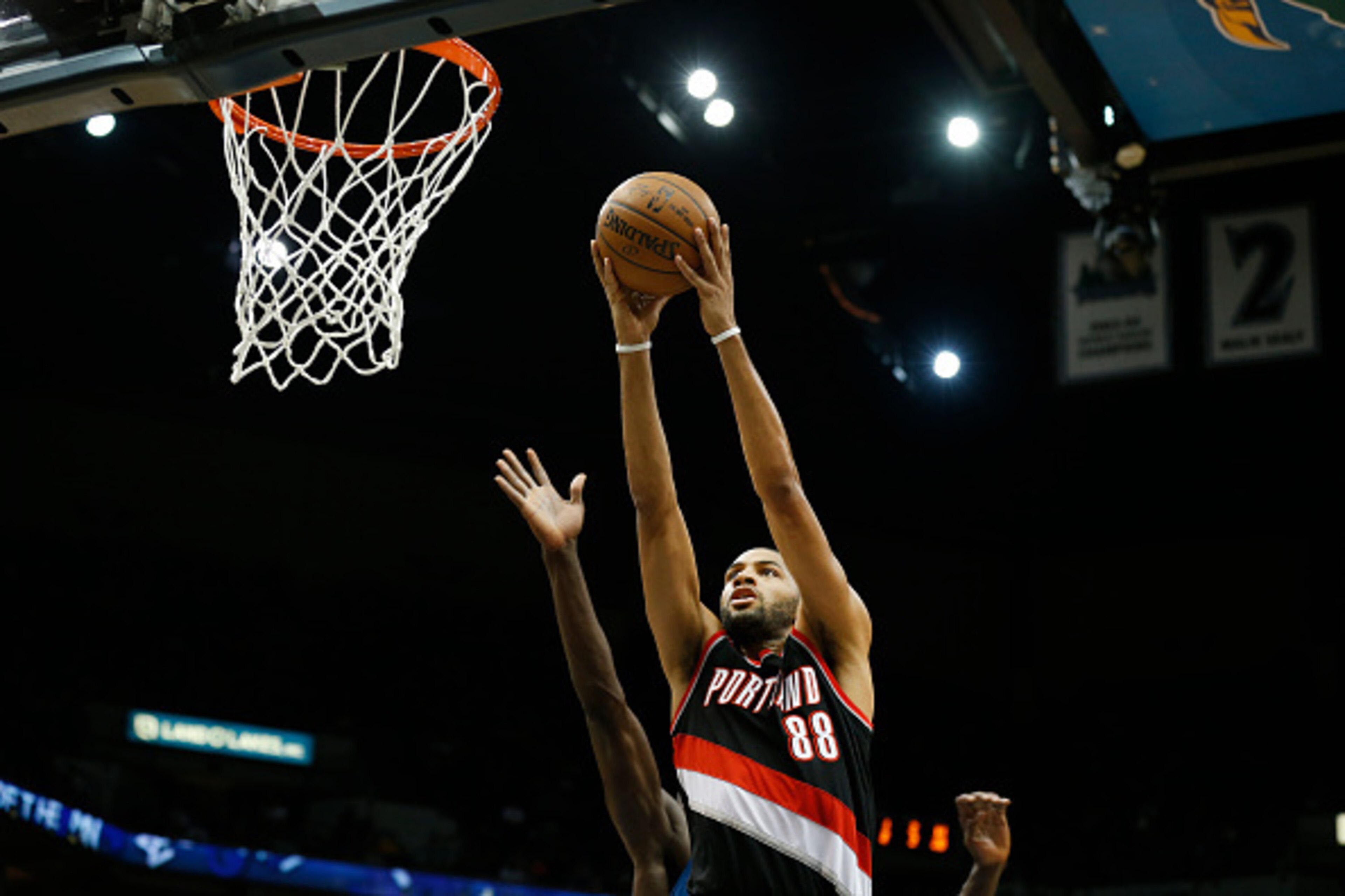 MINNEAPOLIS, MN - MARCH 7: Nicolas Batum #88 of the Portland Trail Blazers goes for the lay up against the Minnesota Timberwolves during the game on March 7, 2015 at Target Center in Minneapolis, Minnesota. NOTE TO USER: User expressly acknowledges and ag