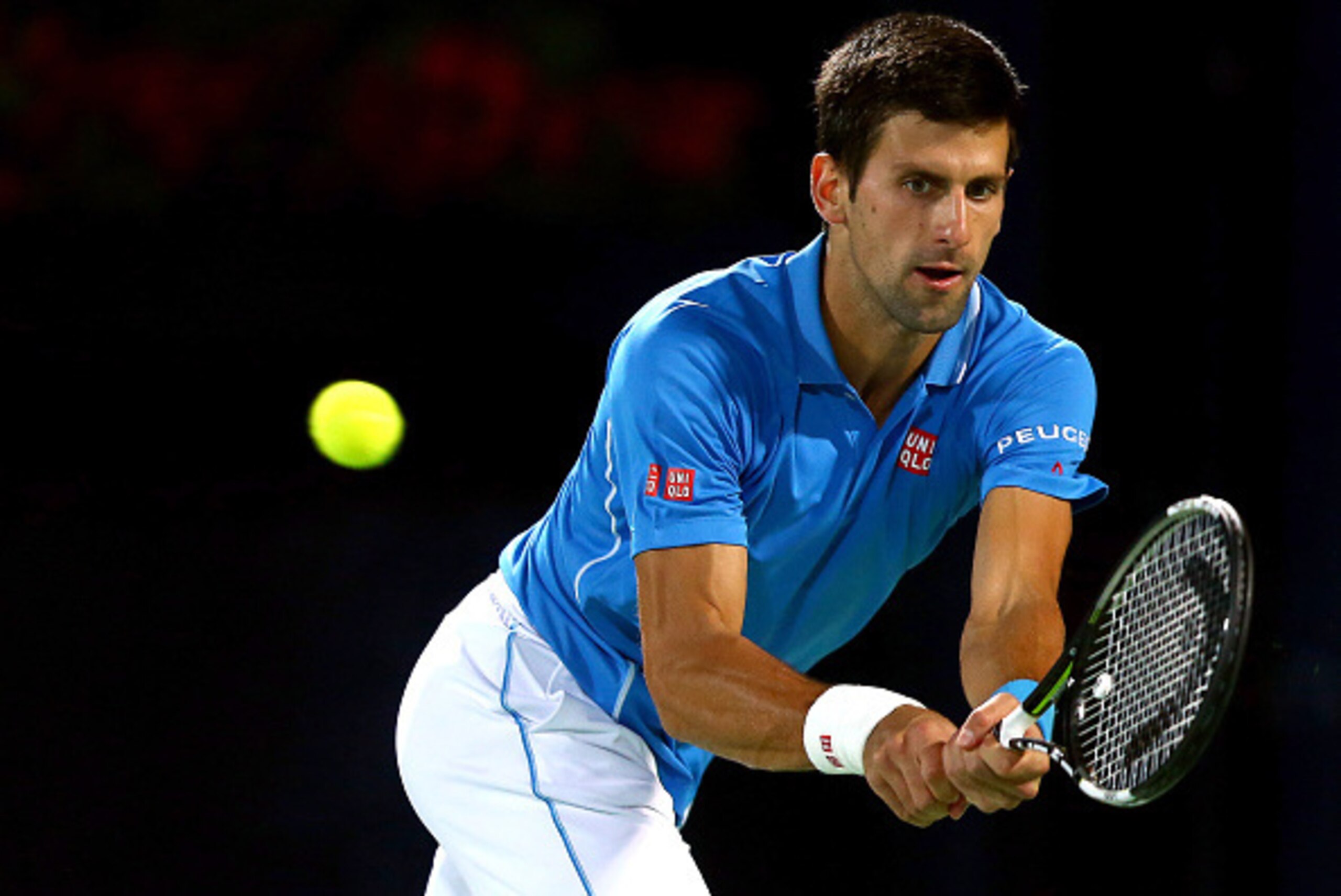 DUBAI, UNITED ARAB EMIRATES - FEBRUARY 26:  Novak Djokovic of Serbia plays a backhand against Marsel Ilhan of Turkey during their men's singles quarterfinal match of the ATP Dubai Duty Free Tennis Championships at the Dubai Duty Free Stadium on February 2