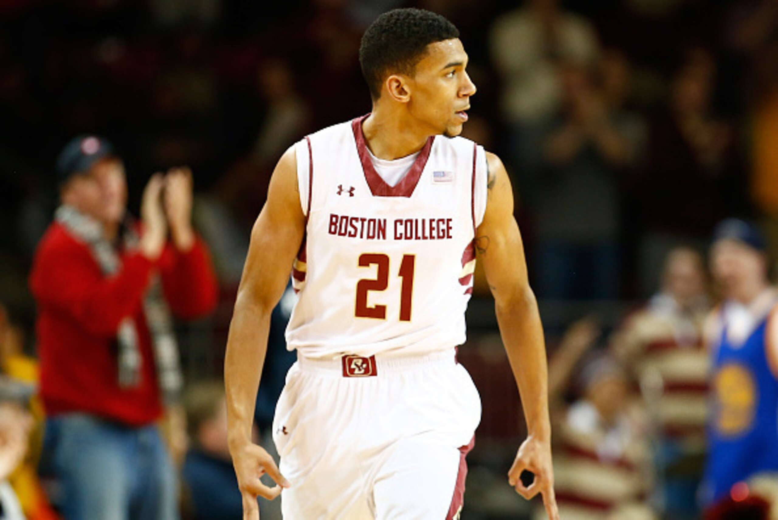 CHESTNUT HILL, MA - JANUARY 17: Olivier Hanlan #21 of the Boston College Eagles celebrates his three-point shot in the first half against the Virginia Cavaliers during the game at Conte Forum on January 17, 2015 in Chestnut Hill, Massachusetts.  (Photo by