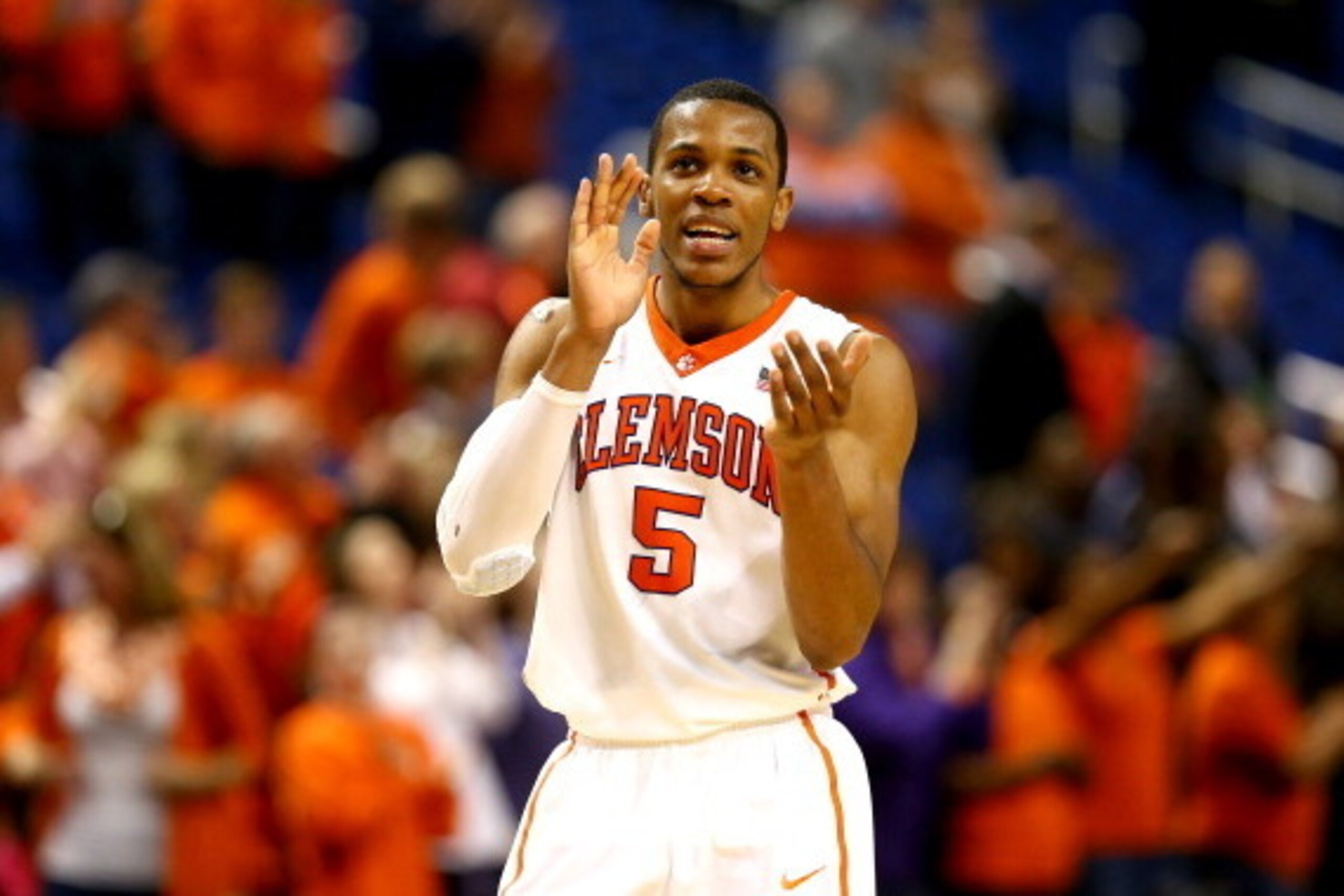 GREENSBORO, NC - MARCH 13:  Jaron Blossomgame #5 of the Clemson Tigers reacts after a play against the Georgia Tech Yellow Jackets during the second round of the 2014 Men's ACC Basketball Tournament at Greensboro Coliseum on March 13, 2014 in Greensboro, 