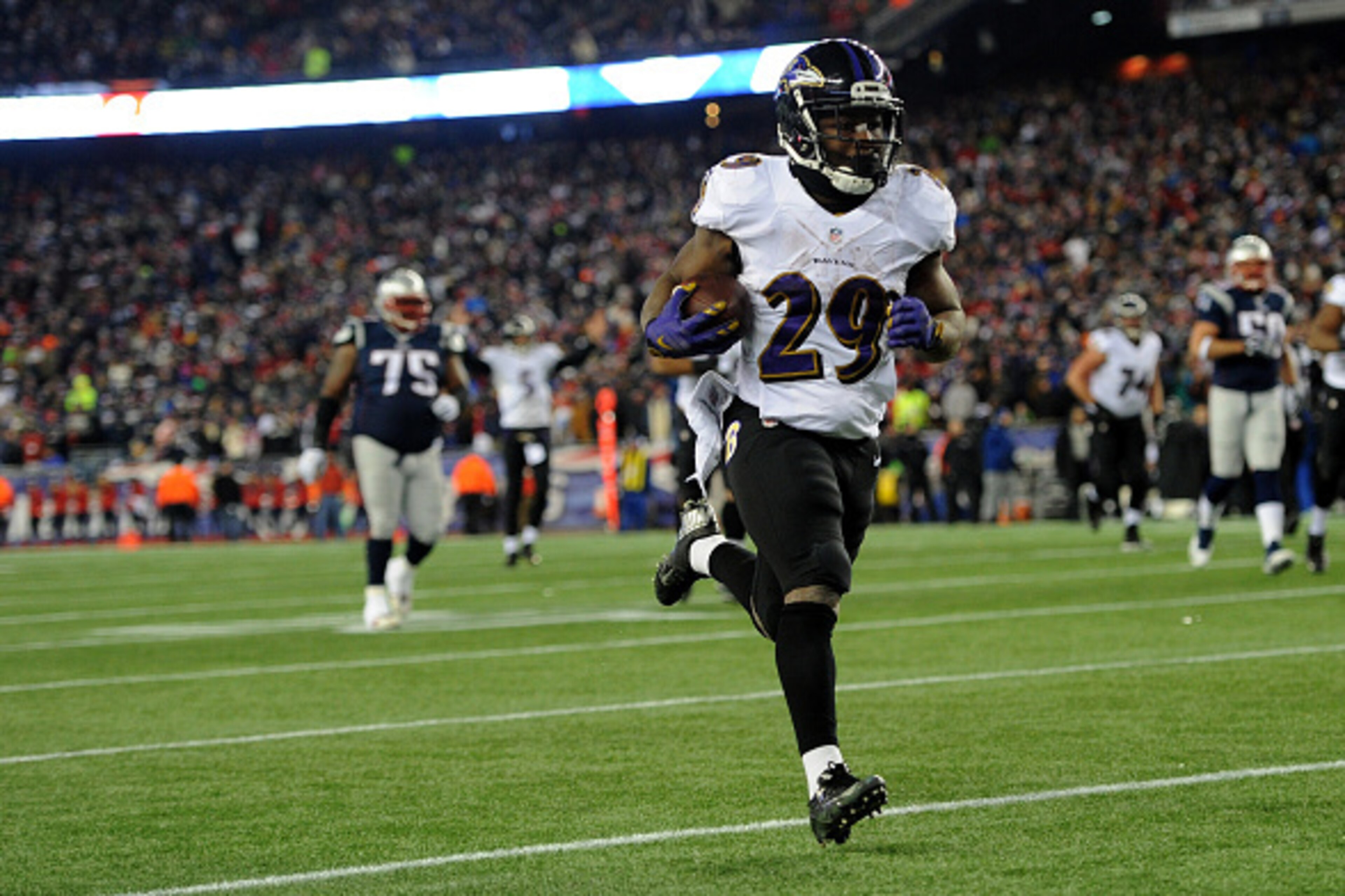 FOXBORO, MA - JANUARY 10: Justin Forsett #29 of the Baltimore Ravens runs for a touchdown in the third quarter against the New England Patriots during the 2015 AFC Divisional Playoffs game at Gillette Stadium on January 10, 2015 in Foxboro, Massachusetts FOXBORO, MA - JANUARY 10: Justin Forsett #29 of the Baltimore Ravens runs for a touchdown in the third quarter against the New England Patriots during the 2015 AFC Divisional Playoffs game at Gillette Stadium on January 10, 2015 in Foxboro, Massachusetts