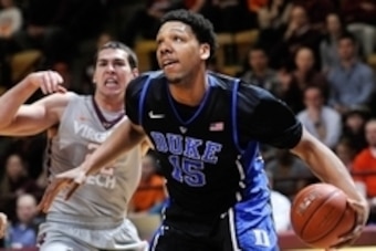 Feb 25, 2015; Blacksburg, VA, USA; Duke Blue Devils center Jahlil Okafor (15) drives to the basket past Virginia Tech Hokies forward Christian Beyer (22) in the first half at Cassell Coliseum. Mandatory Credit: Michael Shroyer-USA TODAY Sports