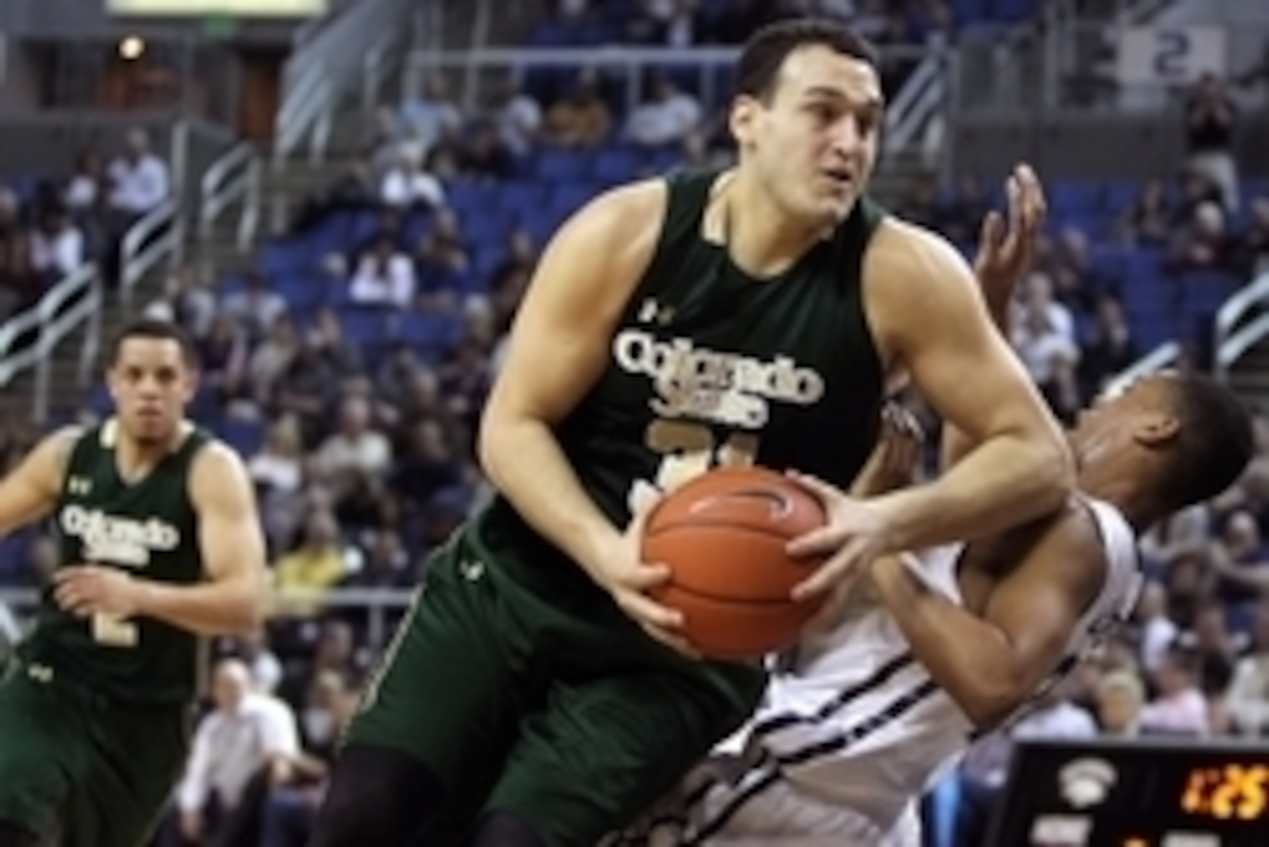 Mar 4, 2015; Reno, NV, USA; Colorado State Rams forward J.J. Avila (31) drives the ball past Nevada Wolf Pack guard Eric Cooper Jr. (21) in the first half of their NCAA basketball game at Lawlor Events Center. Mandatory Credit: Lance Iversen-USA TODAY Spo