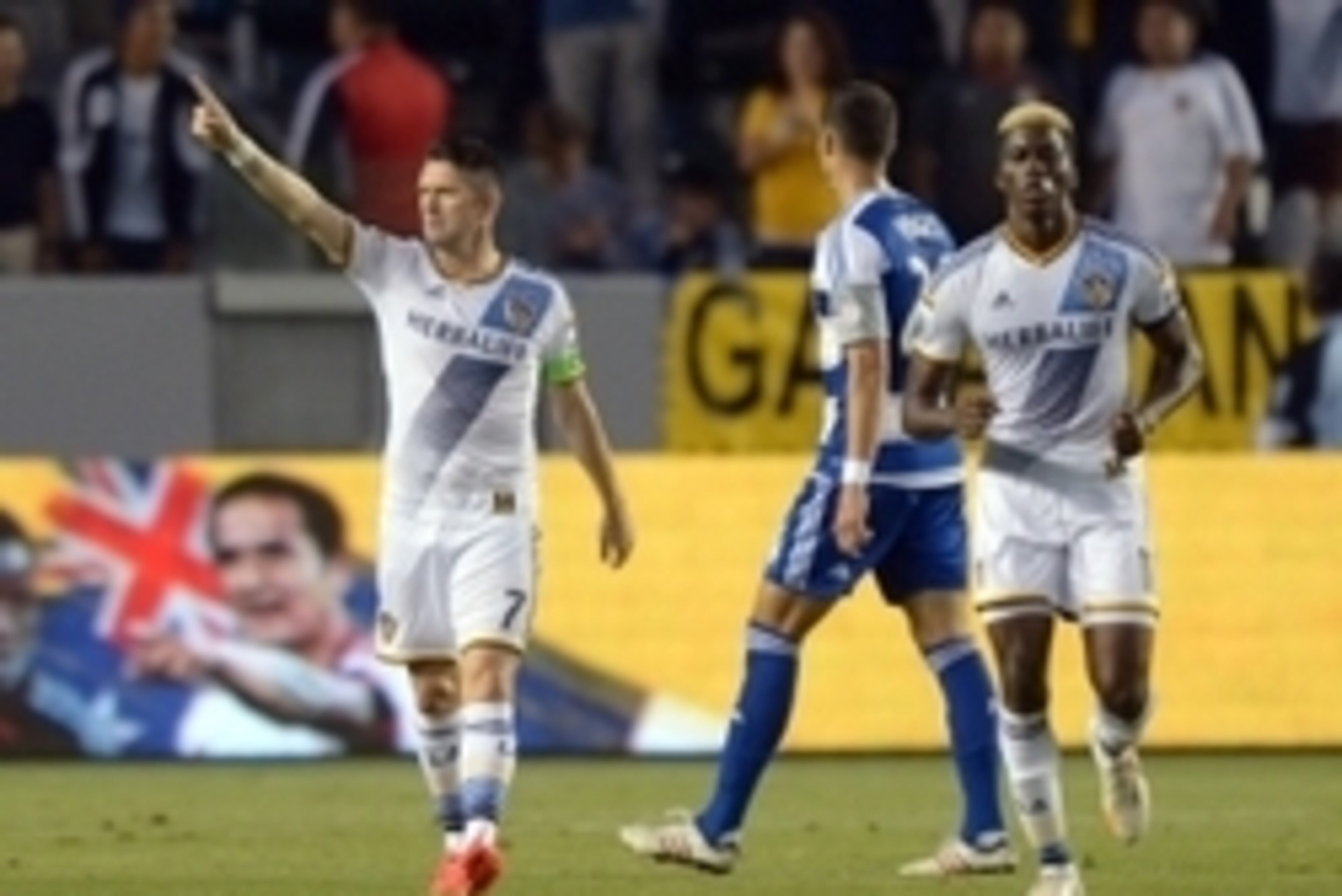 May 21, 2014; Carson, CA, USA; Los Angeles Galaxy forward Robbie Keane (7) celebrates with forward Gyasi Zardes (28) after scoring a goal in the first half against FC Dallas at StubHub Center. Mandatory Credit: Kirby Lee-USA TODAY Sports
