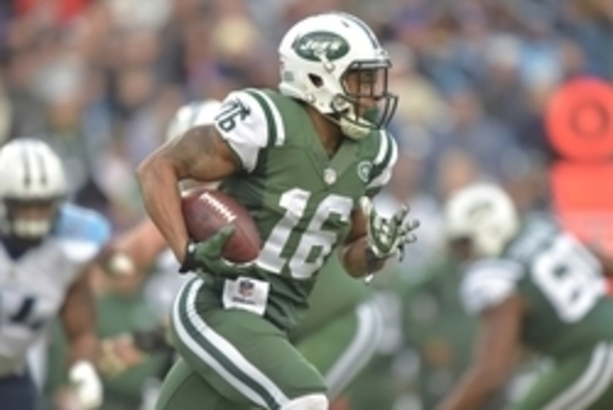 Dec 14, 2014; Nashville, TN, USA; New York Jets wide receiver Percy Harvin (16) carries the ball against the Tennessee Titans during the first half at LP Field. Mandatory Credit: Don McPeak-USA TODAY Sports