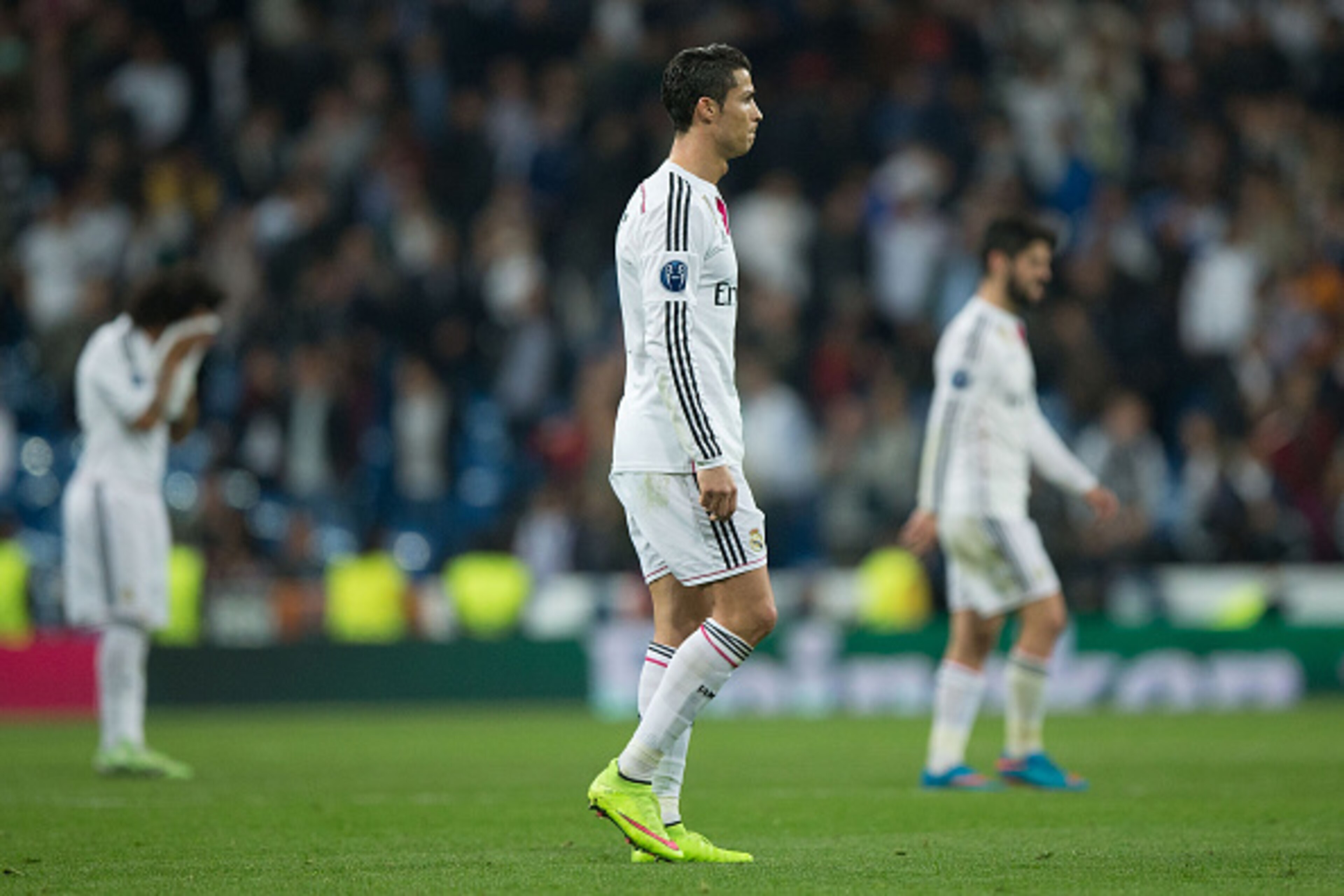 MADRID, SPAIN - MARCH 10: Cristiano Ronaldo of Real Madrid CF leaves the pitch after loosing the UEFA Champions League round of 16 second leg match between Real Madrid CF and FC Schalke 04 at Estadio Santiago Bernabeu on March 10, 2015 in Madrid, Spain.  