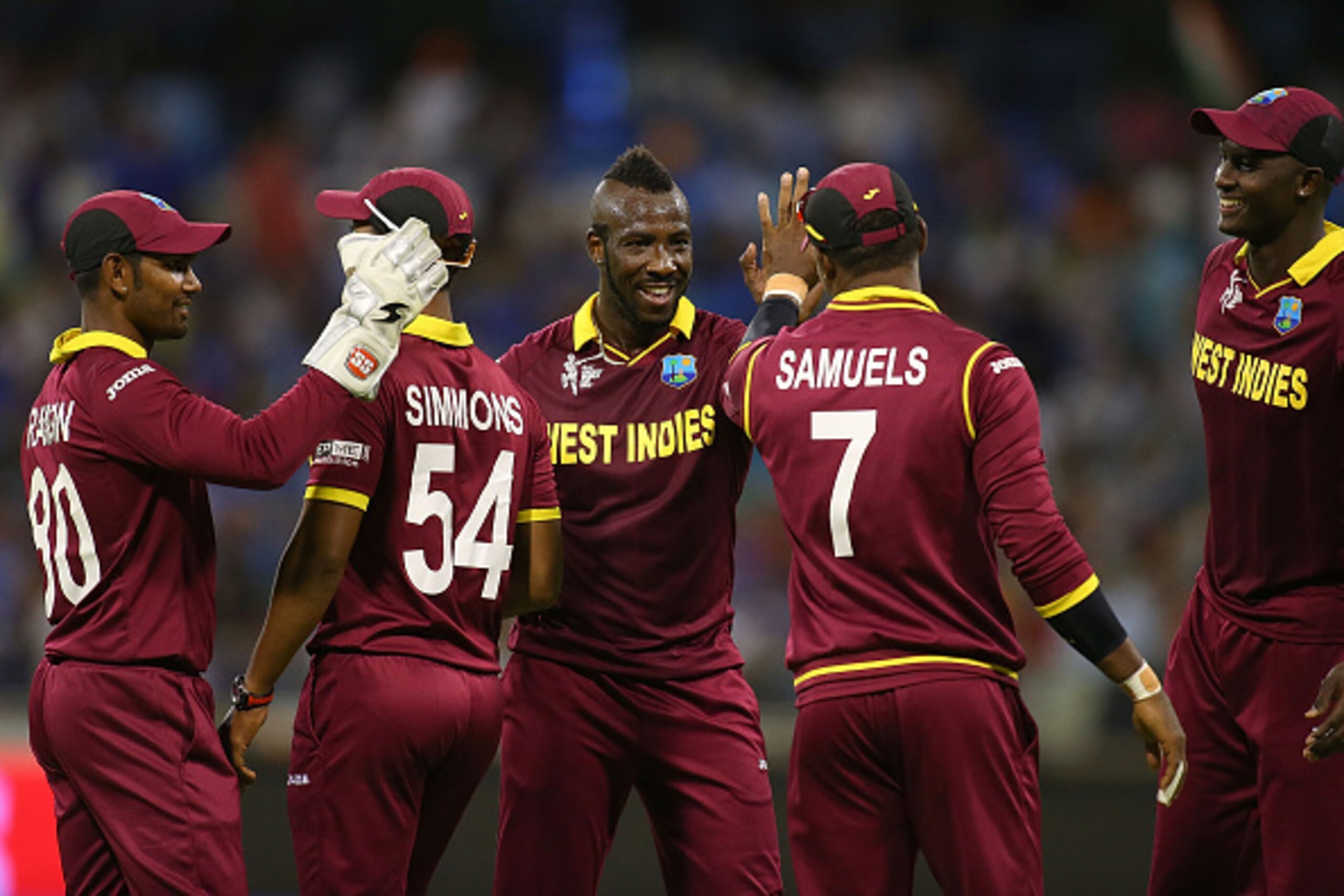 PERTH, AUSTRALIA - MARCH 06: Andre Russell of the West Indies celebrates the wicket of Ravindra Jadeja of India during the 2015 ICC Cricket World Cup match between India and the West Indies at WACA on March 6, 2015 in Perth, Australia. (Photo by Paul Kan PERTH, AUSTRALIA - MARCH 06: Andre Russell of the West Indies celebrates the wicket of Ravindra Jadeja of India during the 2015 ICC Cricket World Cup match between India and the West Indies at WACA on March 6, 2015 in Perth, Australia. (Photo by Paul Kan