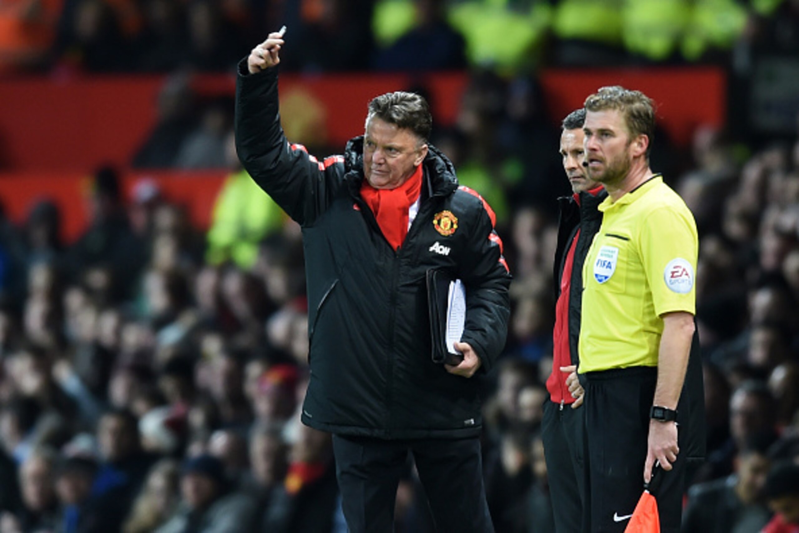 MANCHESTER, ENGLAND - MARCH 09:  Louis van Gaal the manager of Manchester United reacts during the FA Cup Quarter Final match between Manchester United and Arsenal at Old Trafford on March 9, 2015 in Manchester, England.  (Photo by Michael Regan/Getty Ima