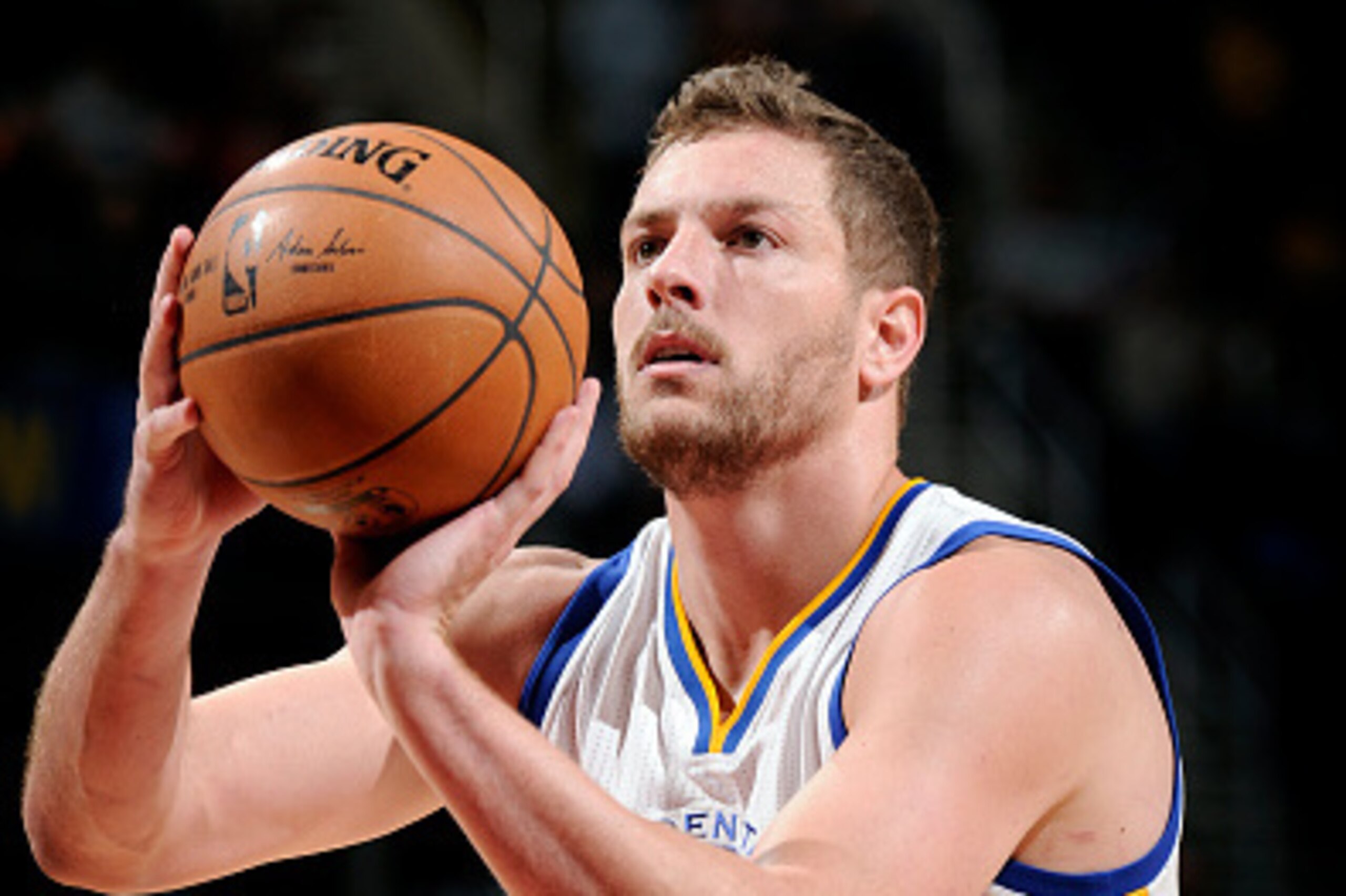 CLEVELAND, OH - FEBRUARY 26: David Lee #10 of the Golden State Warriors attempts a free throw against the Cleveland Cavaliers at The Quicken Loans Arena on February 26, 2015 in Cleveland, Ohio. NOTE TO USER: User expressly acknowledges and agrees that, by