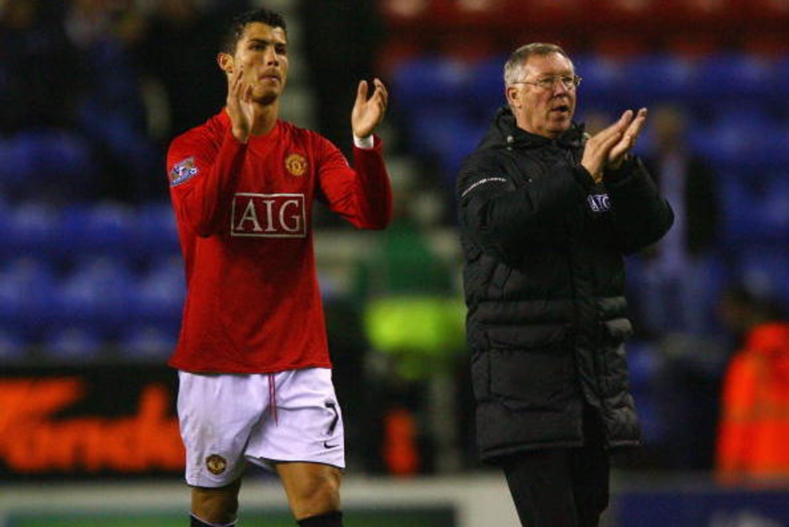 WIGAN, ENGLAND - MAY 13:  Sir Alex Ferguson the manager of Manchester United and Cristiano Ronaldo celebrate after the Barclays Premier League match between Wigan Athletic and Manchester United at the JJB Stadium on May 13, 2009 in Wigan, England.  (Photo